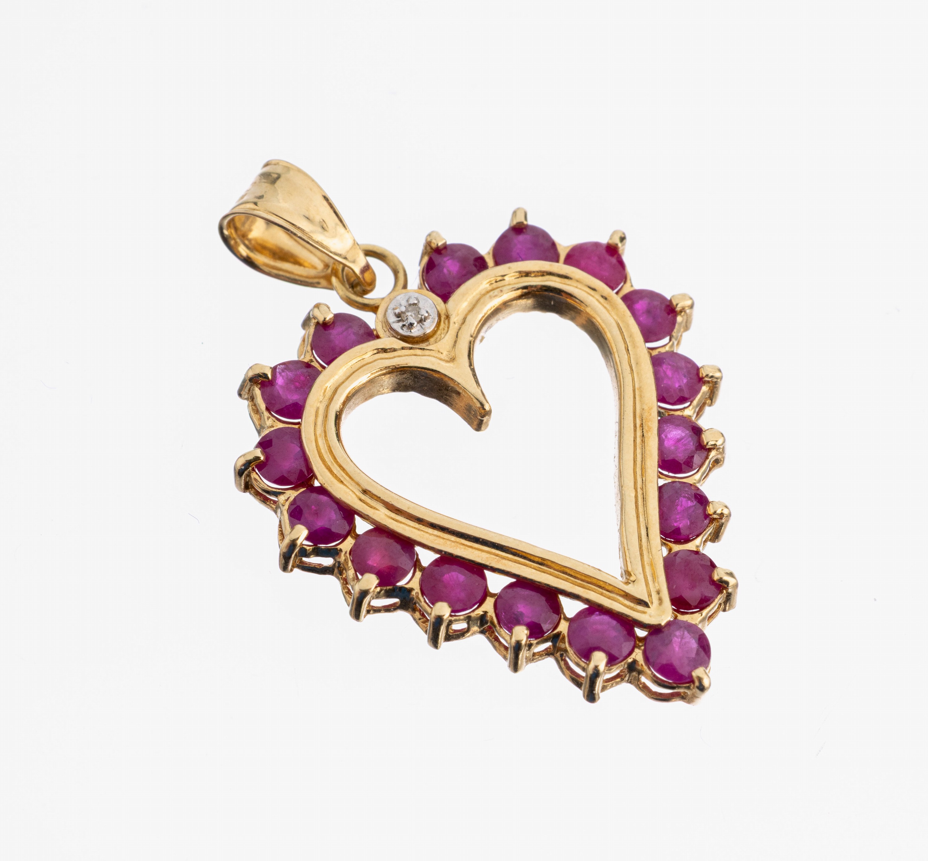 14 kt Gold Rubin-Diamant-Anhänger, GG 585/000, Herz, 17 rundfacett. Rubine zus. ca. 2.55 ct, 1 8/8-Diamant ca. 0.005 ct Weiß/p1, ca. 3.2 x 2.2 cm, ...