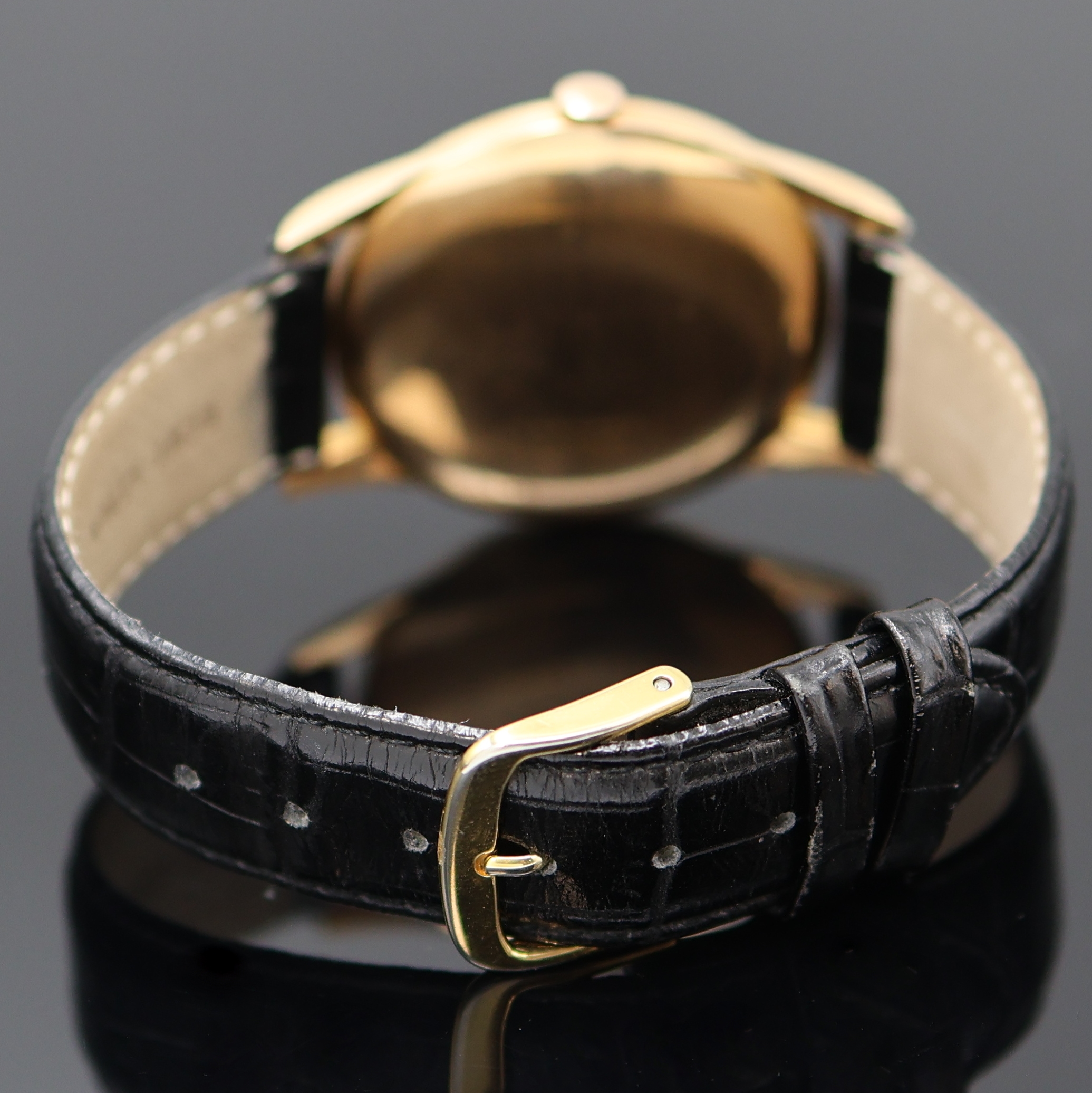 Detail b: UNIVERSAL GENEVE große Herrenarmbanduhr in RG 750/000, Handaufzug, Schweiz um 1949, Einschalengeh., Glasrand aufgedr., Zifferbl. rest., Anz. v. ...