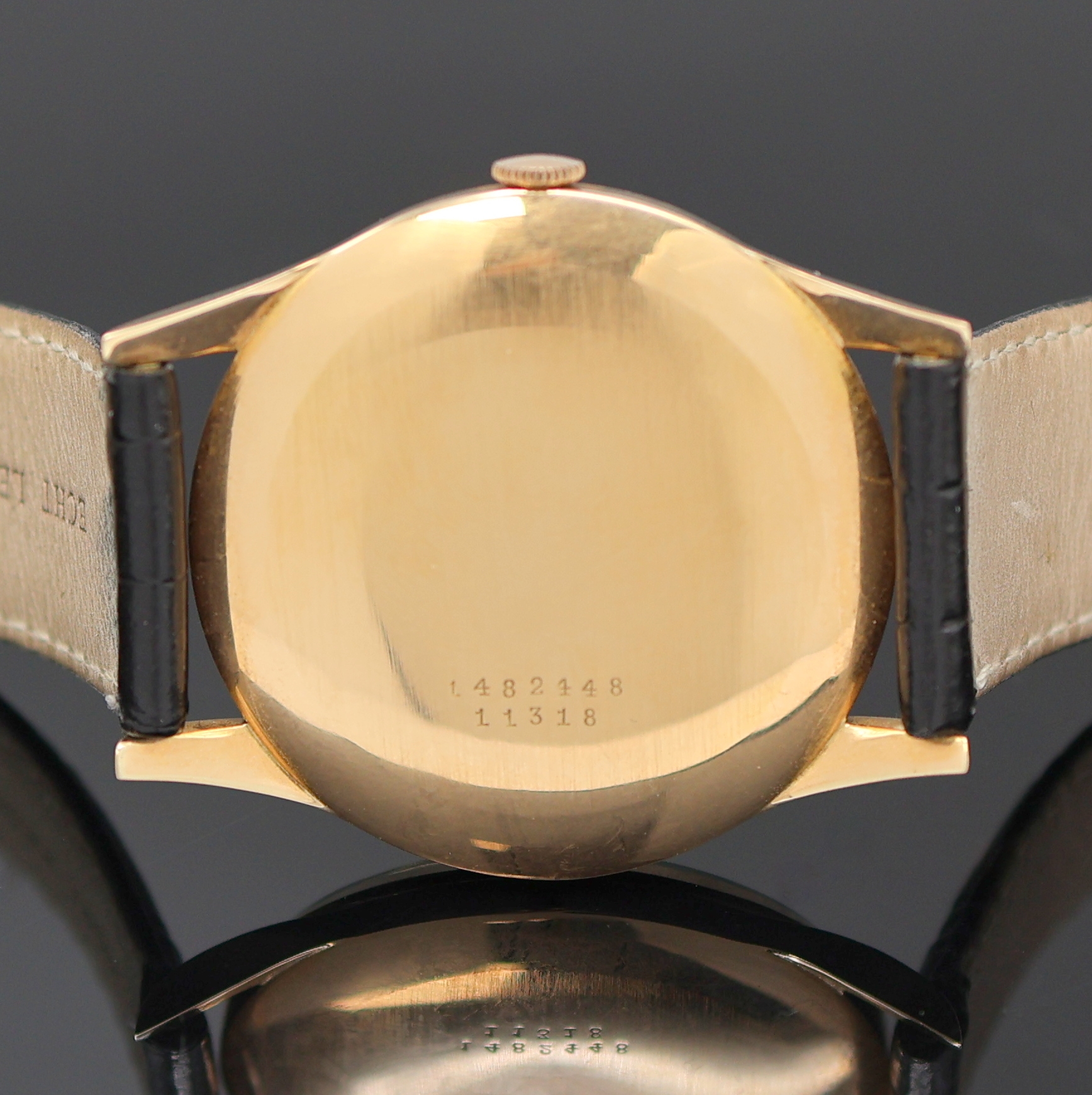 Detail d: UNIVERSAL GENEVE große Herrenarmbanduhr in RG 750/000, Handaufzug, Schweiz um 1949, Einschalengeh., Glasrand aufgedr., Zifferbl. rest., Anz. v. ...
