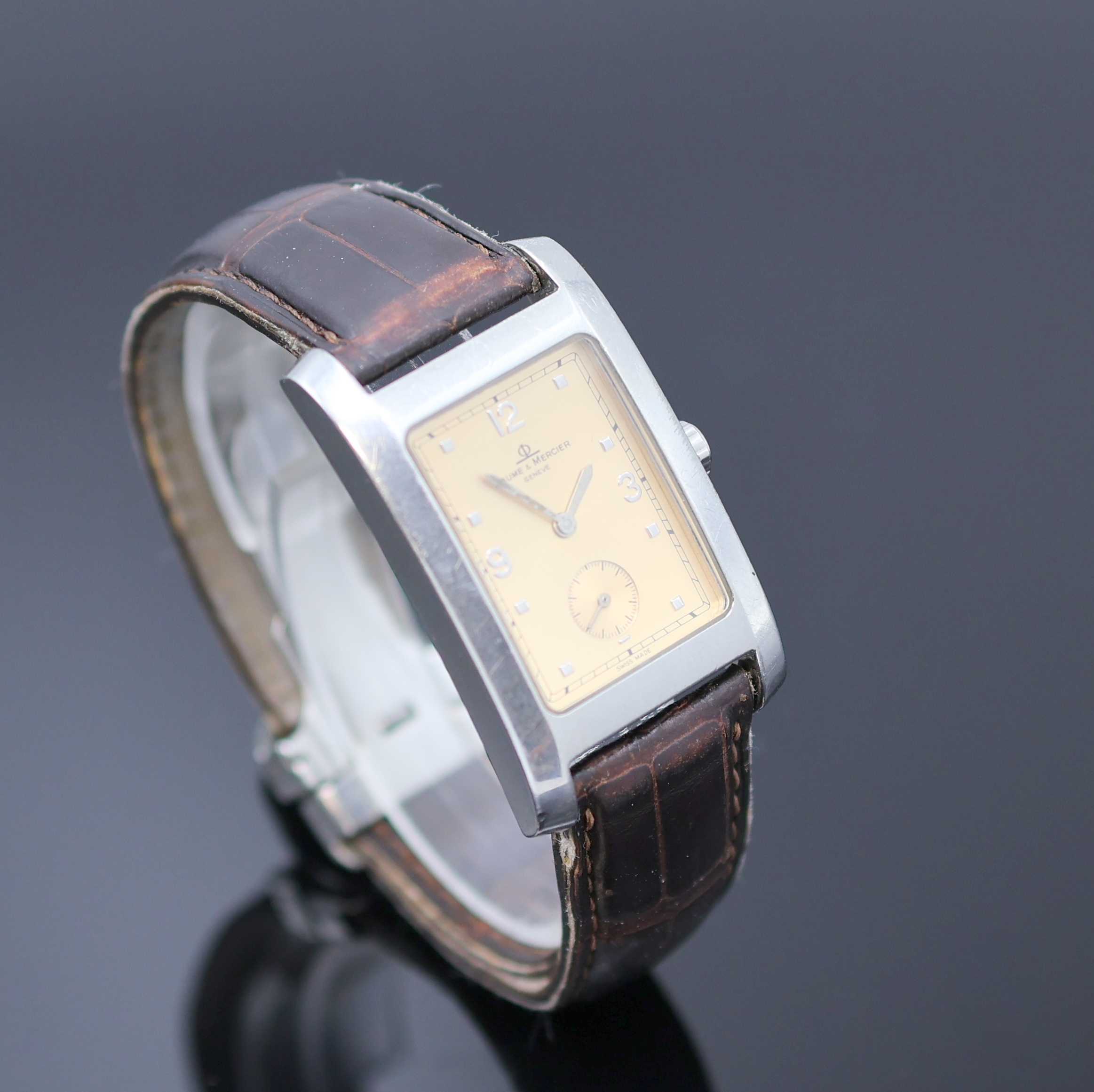 Detail b: BAUME & MERCIER Armbanduhr Serie Hampton in Stahl, Schweiz um 2000, quarz, Boden aufgedr., neutr. Lederband m. orig. Faltschl., kupferfarb. Zifferbl. ...
