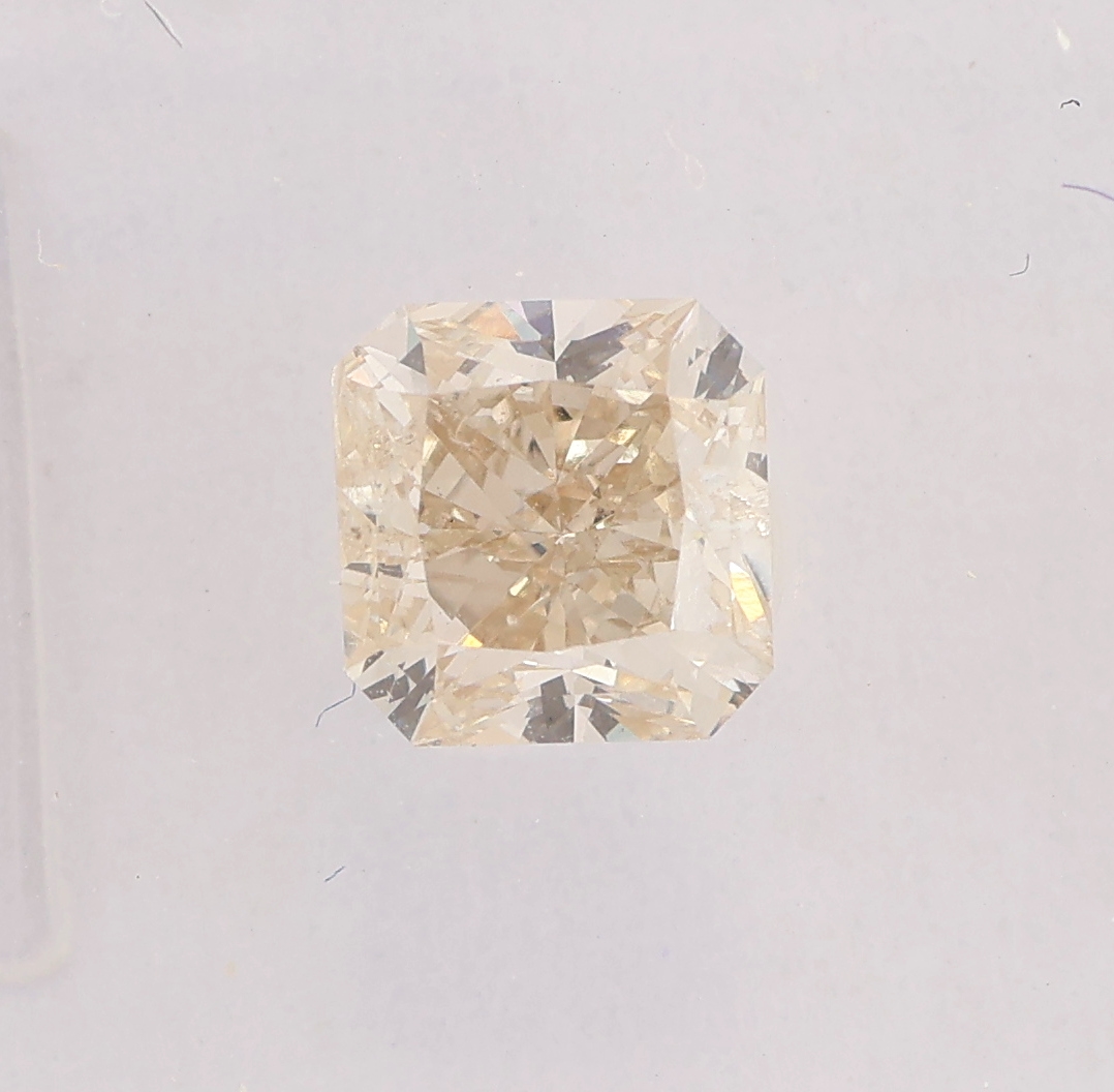 Detail a: Loser Diamant ca. 0.95 ct get.(M)/si2, Cut cornered square, ca. 5.11 x 5.01 x 3.80 mm, IGI Expertise anbei, verschweißt