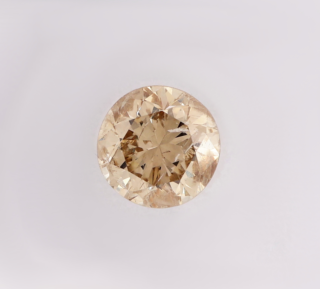 Detail a: Loser Brillant ca. 1.10 ct get.(W-X)/p2, ca. 6.38 x 6.49 x 4.23 mm, IGI Expertise anbei, verschweißt