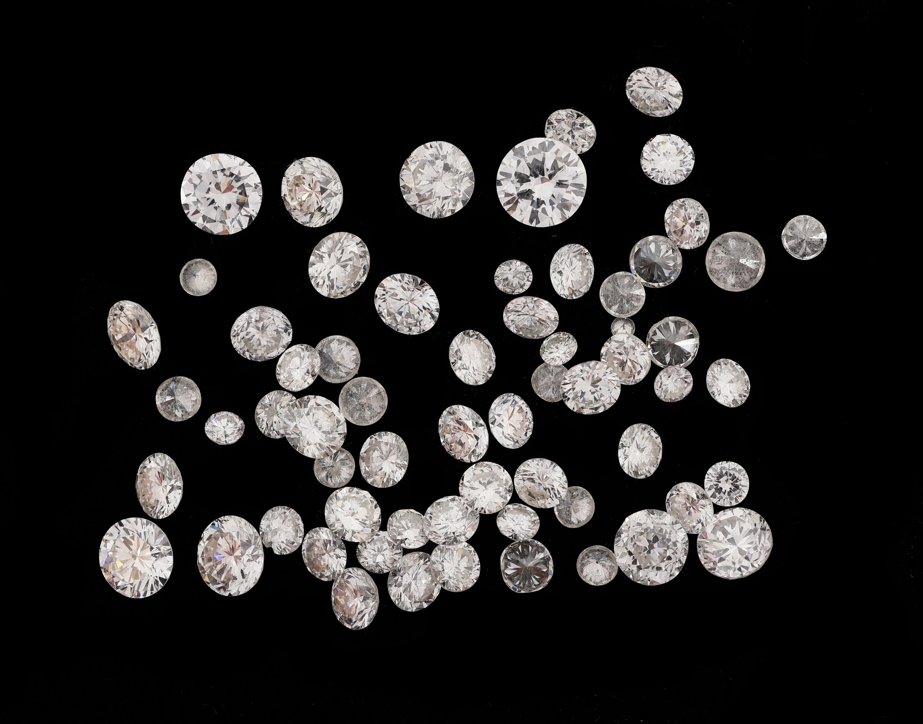 Lot lose Brillanten zus. ca. 7.56 ct Weiß-get.Weiß/vs-p