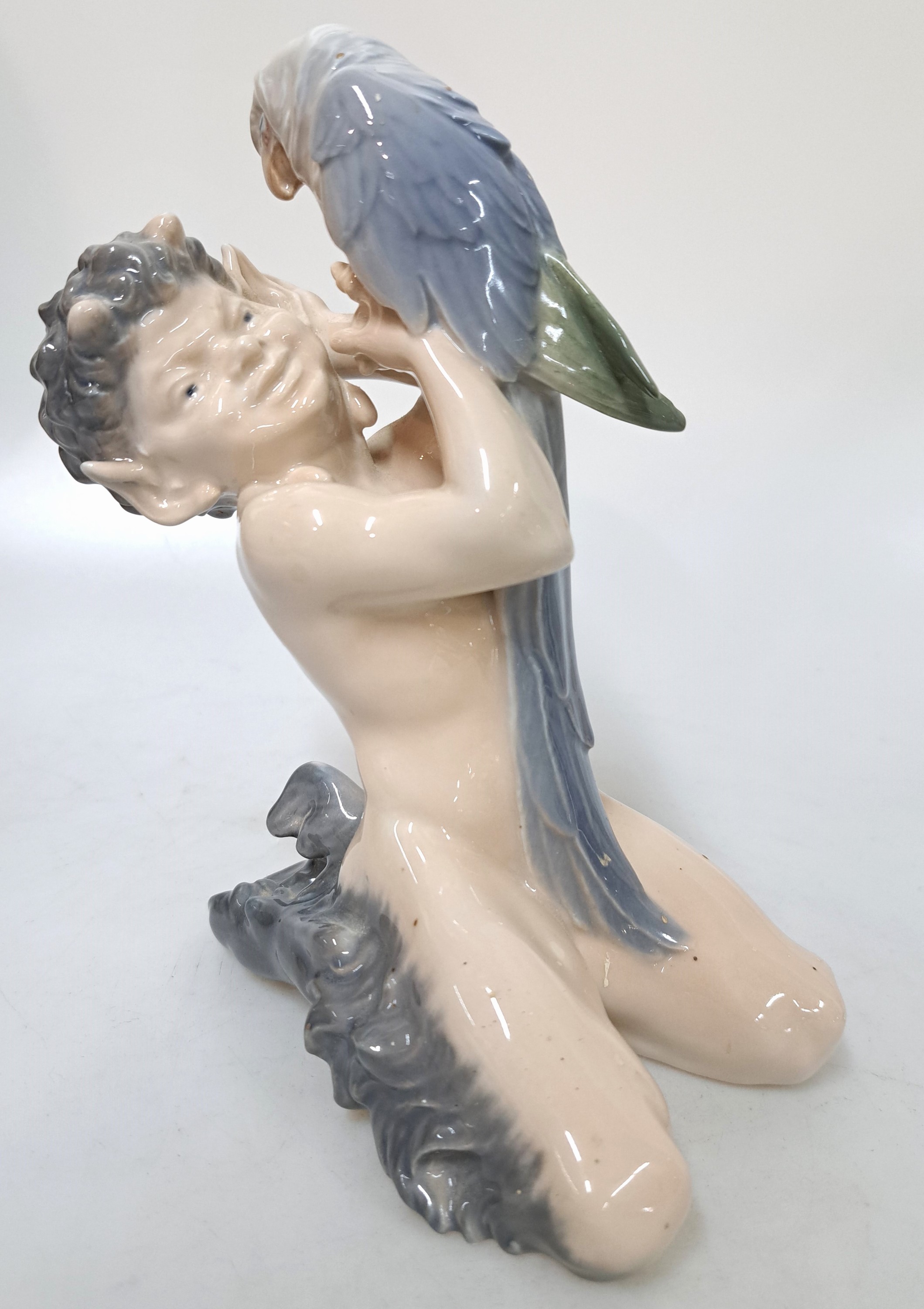 Detail a: Drei Porzellanfiguren, Royal Copenhagen, 20. Jh., Unterglasurbemalung, sitzender Faun mit Panflöte, H. ca. 13 cm, sitzender Faun mit Bär spielend, ...
