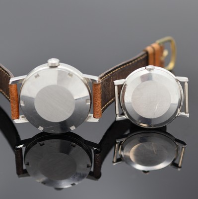 26986999d - OMEGA 2 Armbanduhren in Stahl, Schweiz um 1965/1972, 2-tlg. Geh., silb. Zifferblätter ...