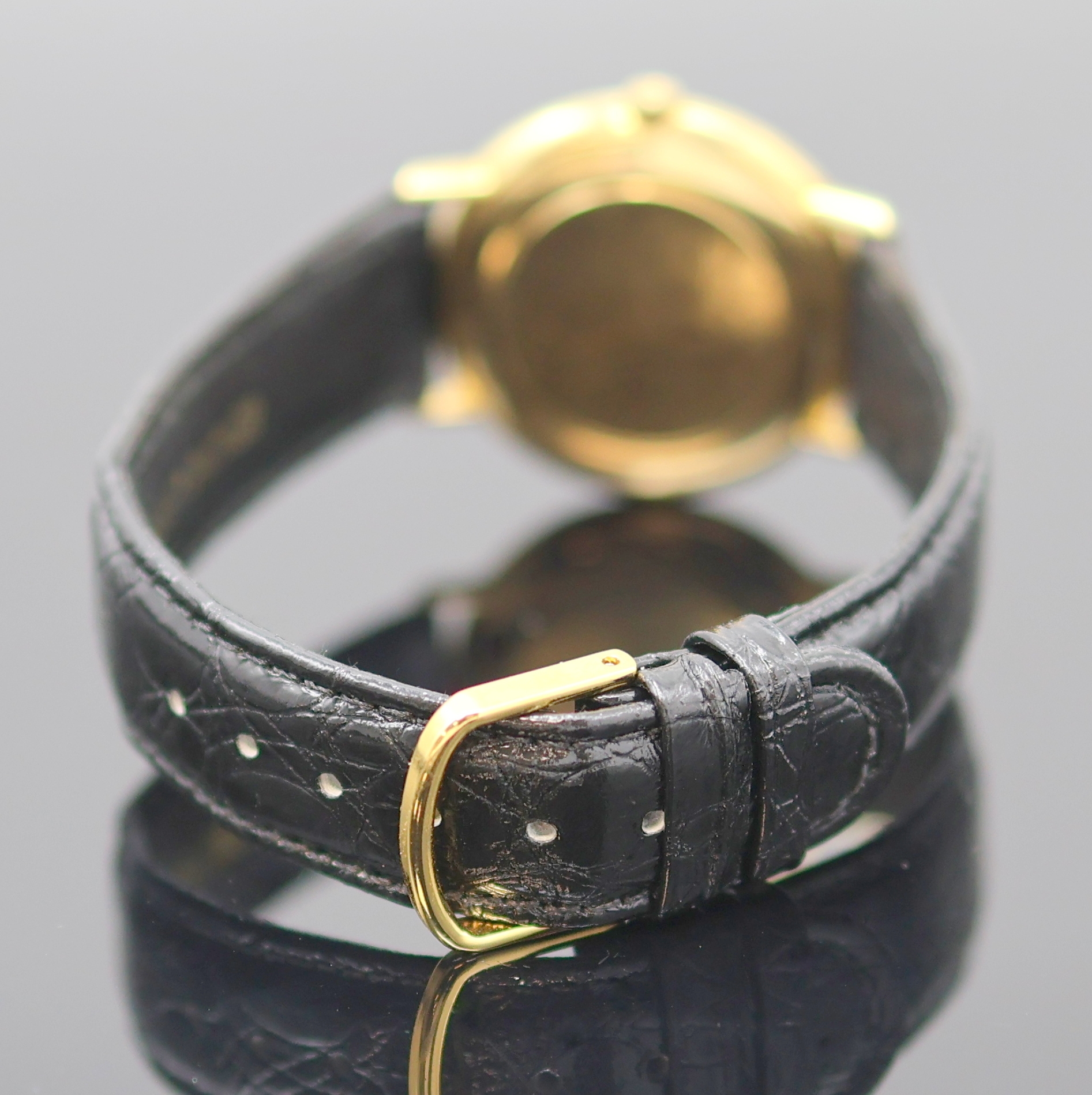 Detail c: OMEGA Herrenarmbanduhr in GG 750/000 Referenz 131016, Schweiz um 1965, Handaufzug, 2-tlg. Geh., Lünette aufgedr., silb. Zifferbl. pat., gold. ...