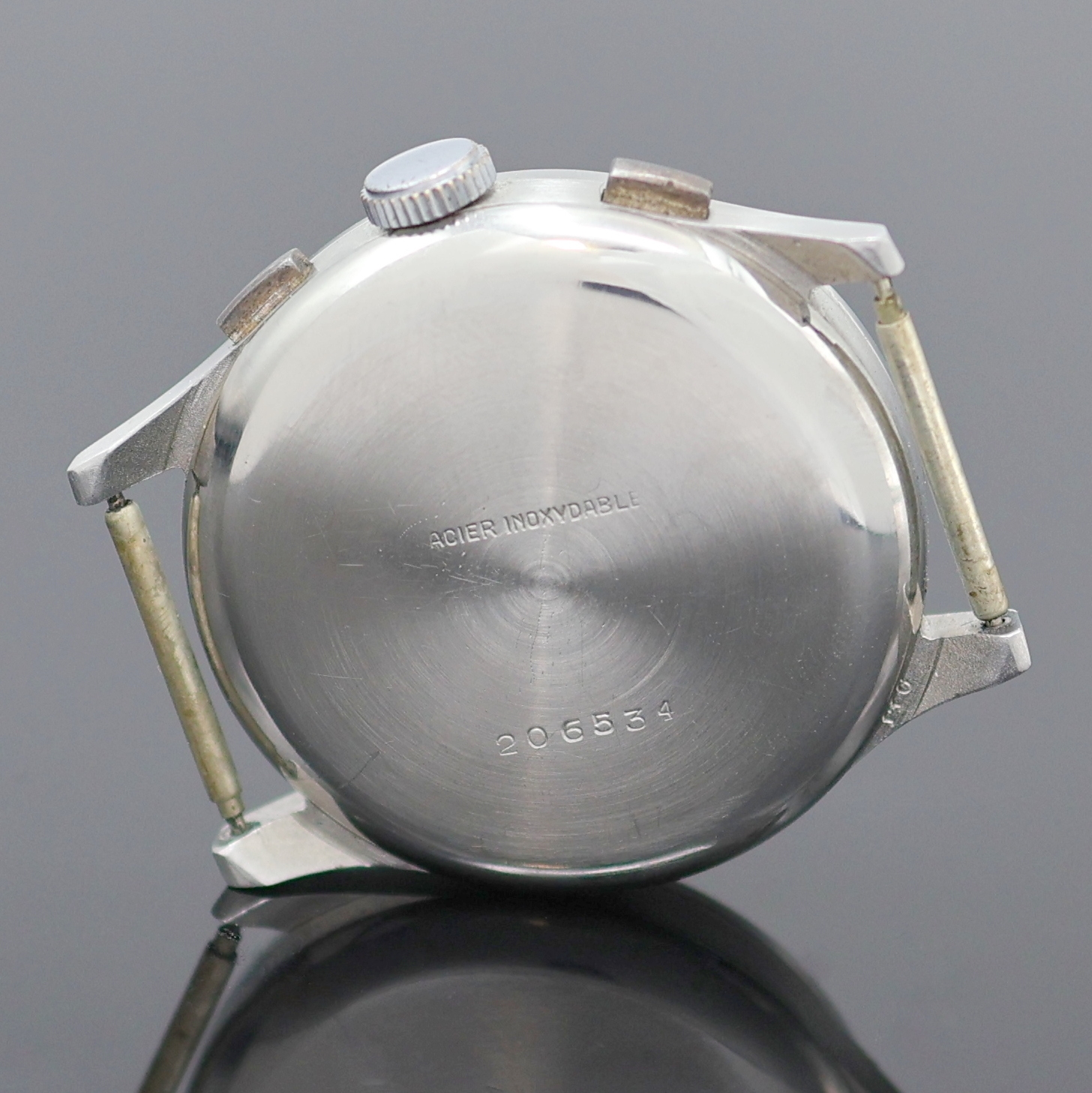 Detail c: MOBILIA Schaltradchronograph in Stahl, Schweiz um 1945, Handaufzug, 3-tlg. Geh., Boden u. Glasrand aufgedr., schwarz/graues Glanz-Zifferbl. pat., ...