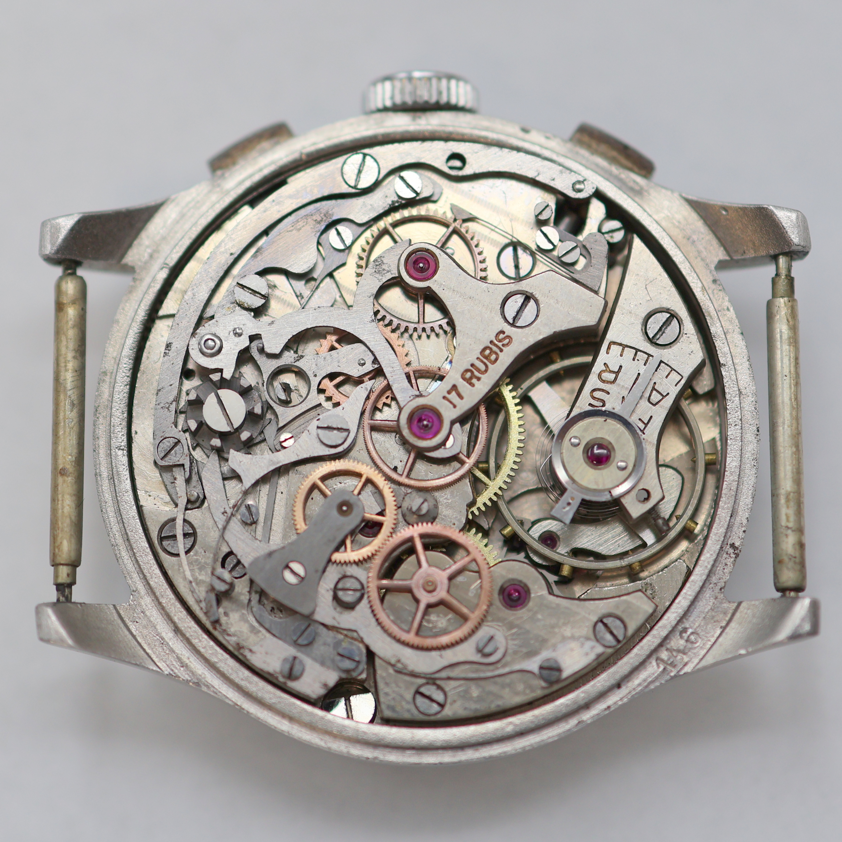 Detail d: MOBILIA Schaltradchronograph in Stahl, Schweiz um 1945, Handaufzug, 3-tlg. Geh., Boden u. Glasrand aufgedr., schwarz/graues Glanz-Zifferbl. pat., ...