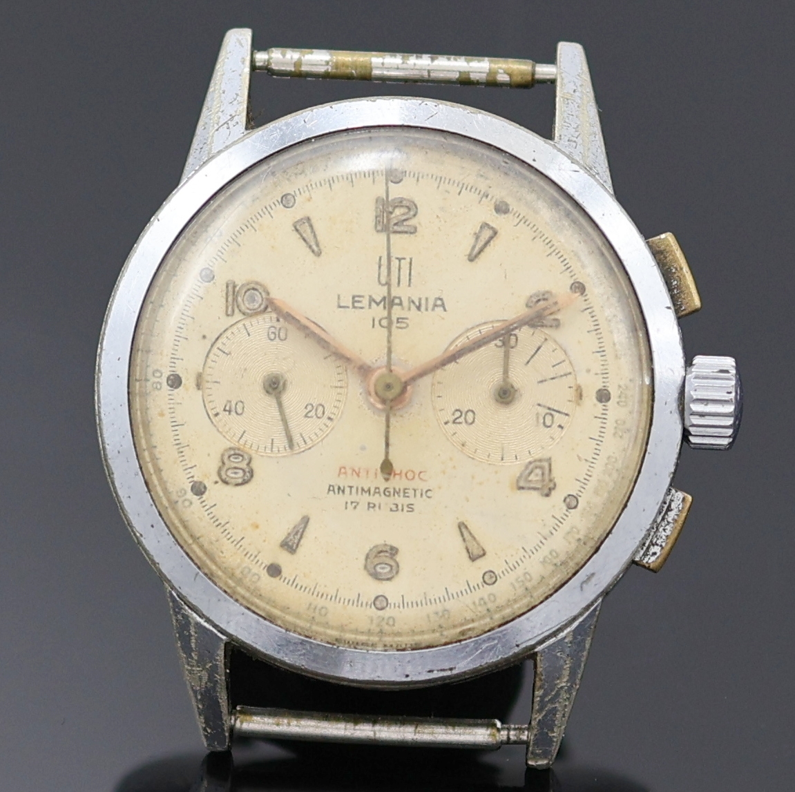 Detail a: UTI / LEMANIA 105 Armbandchronograph im verchromten Gehäuse, Schweiz um 1950, Handaufzug, 3-tlg. Geh. ber., Glasrand u. Stahlboden aufgedr., silb. ...