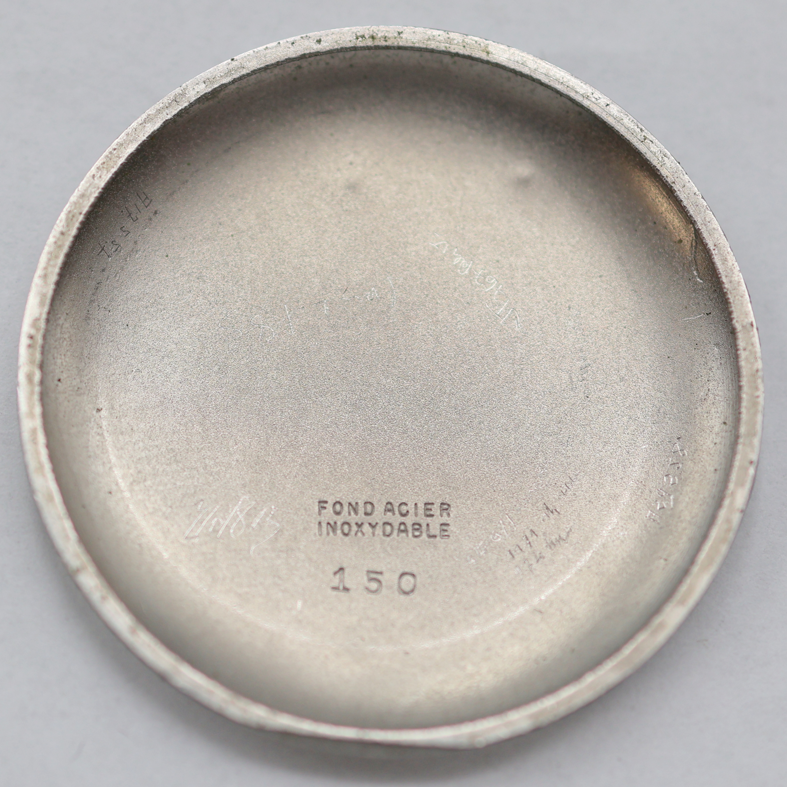 Detail e: UTI / LEMANIA 105 Armbandchronograph im verchromten Gehäuse, Schweiz um 1950, Handaufzug, 3-tlg. Geh. ber., Glasrand u. Stahlboden aufgedr., silb. ...