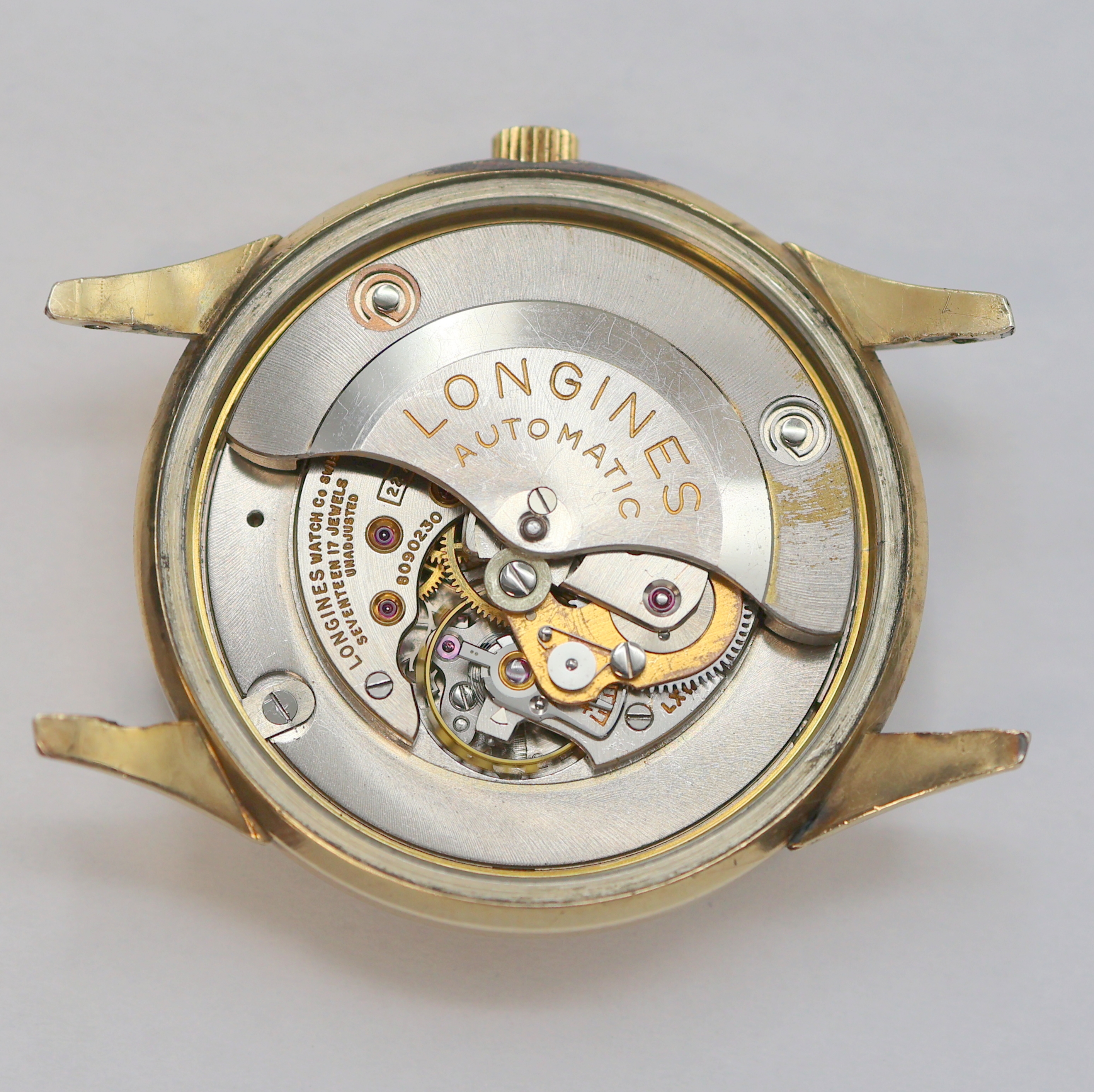 Detail d: LONGINES Herrenarmbanduhr in 10K Gold Filled Kaliber 22A, Schweiz / USA um 1950, Automatik, 2-tlg. Geh., Boden verschr., silb. Zifferbl. ber./pat., ...