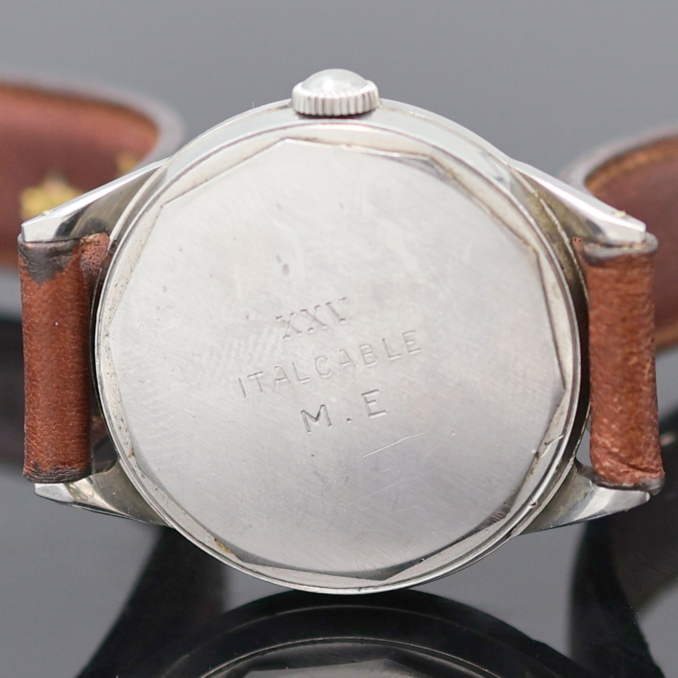 Detail e: MOVADO Sport Herrenarmbanduhr in Stahl Referenz 18126, Schweiz um 1950, Handaufzug, verschr. F. BORGEL Geh., orig. Krone, silb. Zifferbl. m. arab. ...