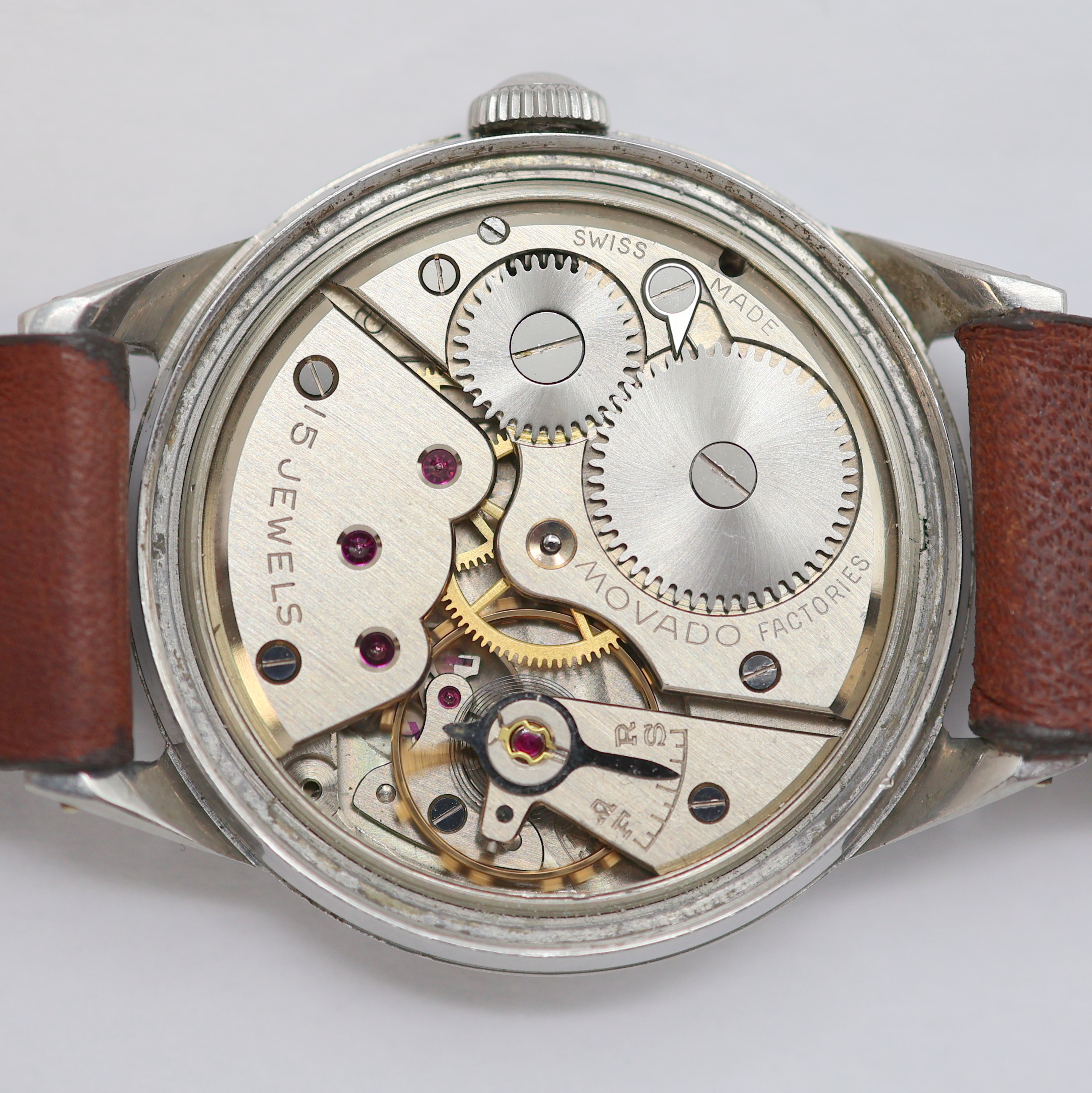 Detail f: MOVADO Sport Herrenarmbanduhr in Stahl Referenz 18126, Schweiz um 1950, Handaufzug, verschr. F. BORGEL Geh., orig. Krone, silb. Zifferbl. m. arab. ...