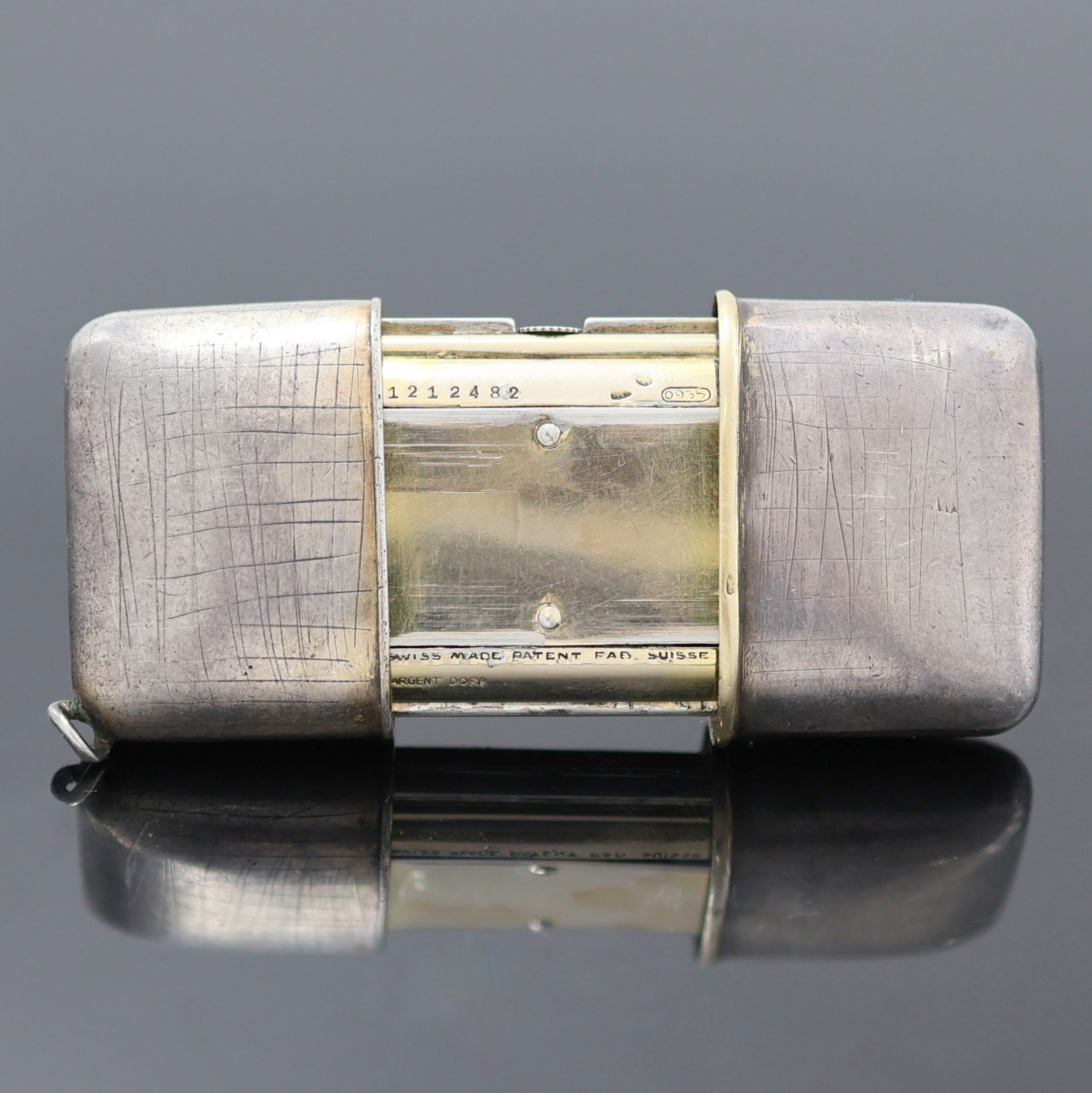 Detail e: MOVADO ERMETO Reiseuhr in Silber, Schweiz um 1938, Aufzug durch öffnen und schließen des Geh., glattes, 2-schaliges Geh., ehemals m. Leder bezogen, ...