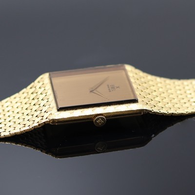 26987098c - EBEL ausgefallene und schwere Herrenarmbanduhr in GG 750/000, Schweiz um 1975, ...