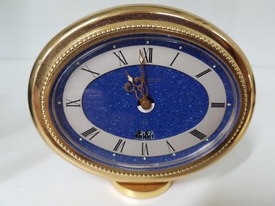 26987266b - Tischuhr Jaeger-LeCoultre, um 1970, vergoldetes Gehäuse, oval liegend, Weckzeit- ...