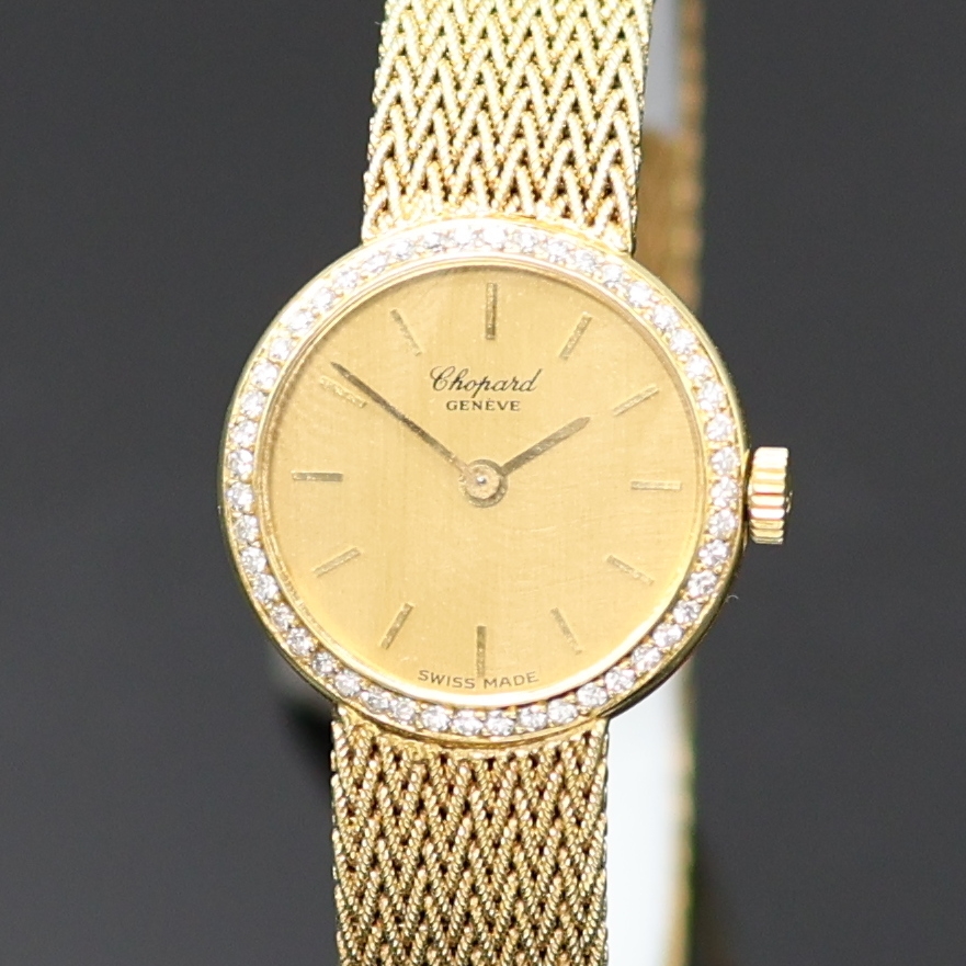 Detail a: CHOPARD Damenarmbanduhr in GG 750/000 mit Diamanten Referenz 4046, Schweiz um 1975, quarz, orig. Goldband, Boden aufgedr., Lünette aufw. m. ...
