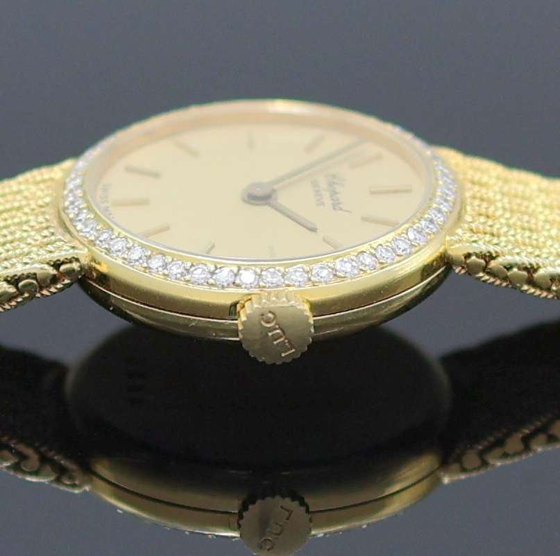 Detail c: CHOPARD Damenarmbanduhr in GG 750/000 mit Diamanten Referenz 4046, Schweiz um 1975, quarz, orig. Goldband, Boden aufgedr., Lünette aufw. m. ...