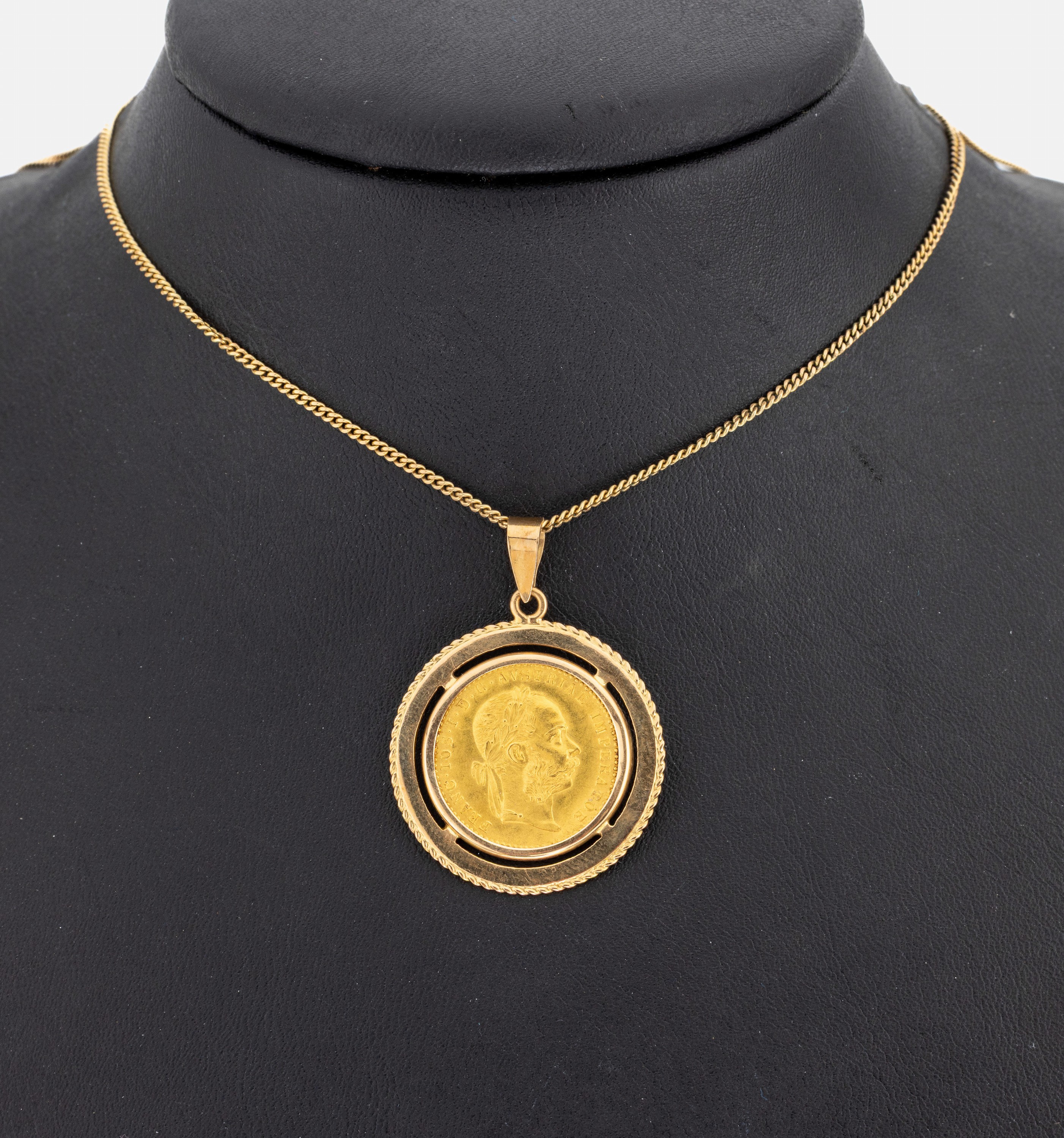 18 kt Gold Münz-Anhänger, GG 750/000, 20 Kronen, Österreich-Ungarn 1915, offizielle Nachprägung, an Kette 14 kt Gold, L. ca. 61 cm, ...