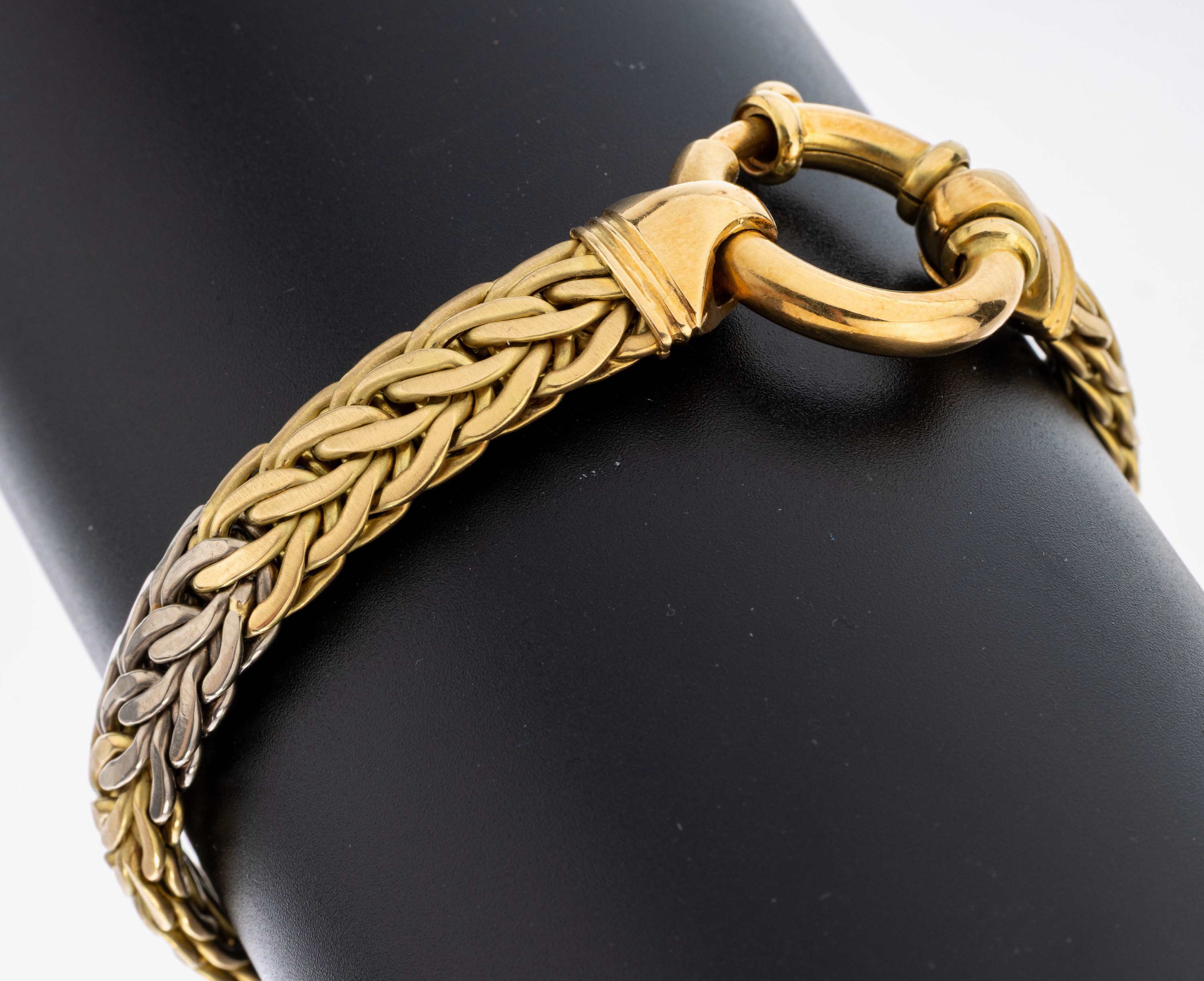 18 kt Gold Armband, WG/GG 750/000, z.T. sat. und pol., L. ca. 21 cm, Federringschließe, ca. 36.3 g