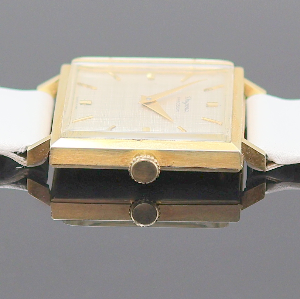 Detail c: DUGENA Precision quadratische Armbanduhr in GG 585/000, Schweiz um 1965, Handaufzug, Boden aufgedr., silb. Strukturzifferbl. m. gold. Std.-Ind., ...
