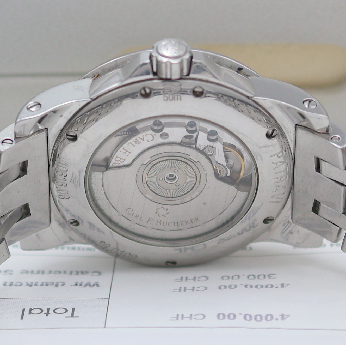 Detail e: CARL F. BUCHERER Armbanduhr Patravi in Stahl Referenz 10616.08, Schweiz um 2006, Automatik, beids. vergl. Edelstahlgeh. inkl. Gliederband m. dopp. ...