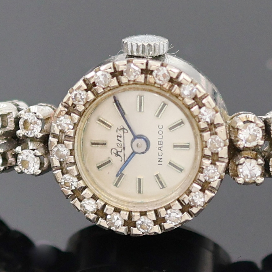 Detail a: RENZ diamantbesetzte Damenarmbanduhr in WG 585/000, Schweiz um 1965, Handaufzug, 2-tlg. Geh. m. anges. Goldband in WG 585/000, Boden aufgedr., silb. ...