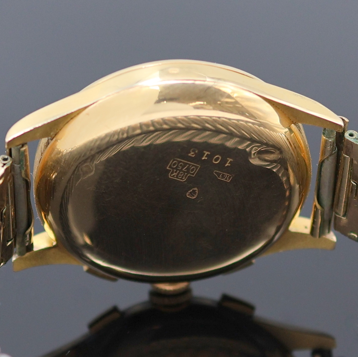 Detail d: CHRONOGRAPHE SUISSE Armbandchronograph in RoseG 750/000, Schweiz um 1950, Handaufzug, Geh. dell., Boden aufgedr., verg. Flexband, Metall Innendeckel, ...