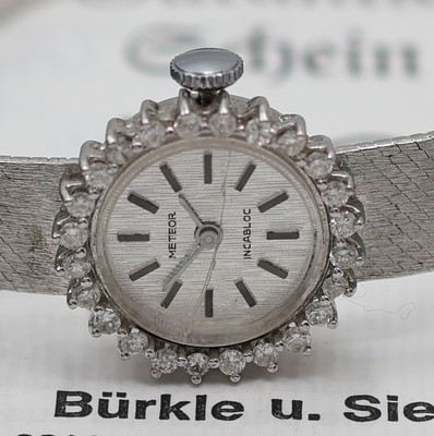 26987662a - METEOR diamantbesetzte Damenarmbanduhr in WG 585/000, Schweiz um 1975, Handaufzug, ...