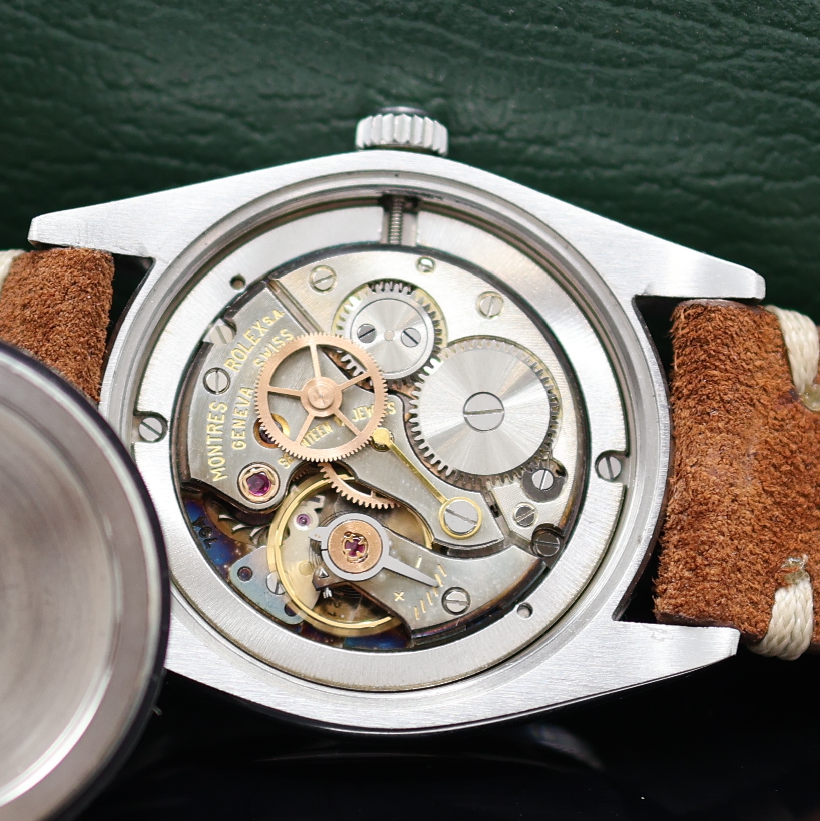 Detail e: ROLEX Oysterdate Precision Armbanduhr in Edelstahl Referenz 6694, Schweiz um 1965, Handaufzug, 3-teil. Geh., Lederband m. orig. Dornschl., Boden u. ...