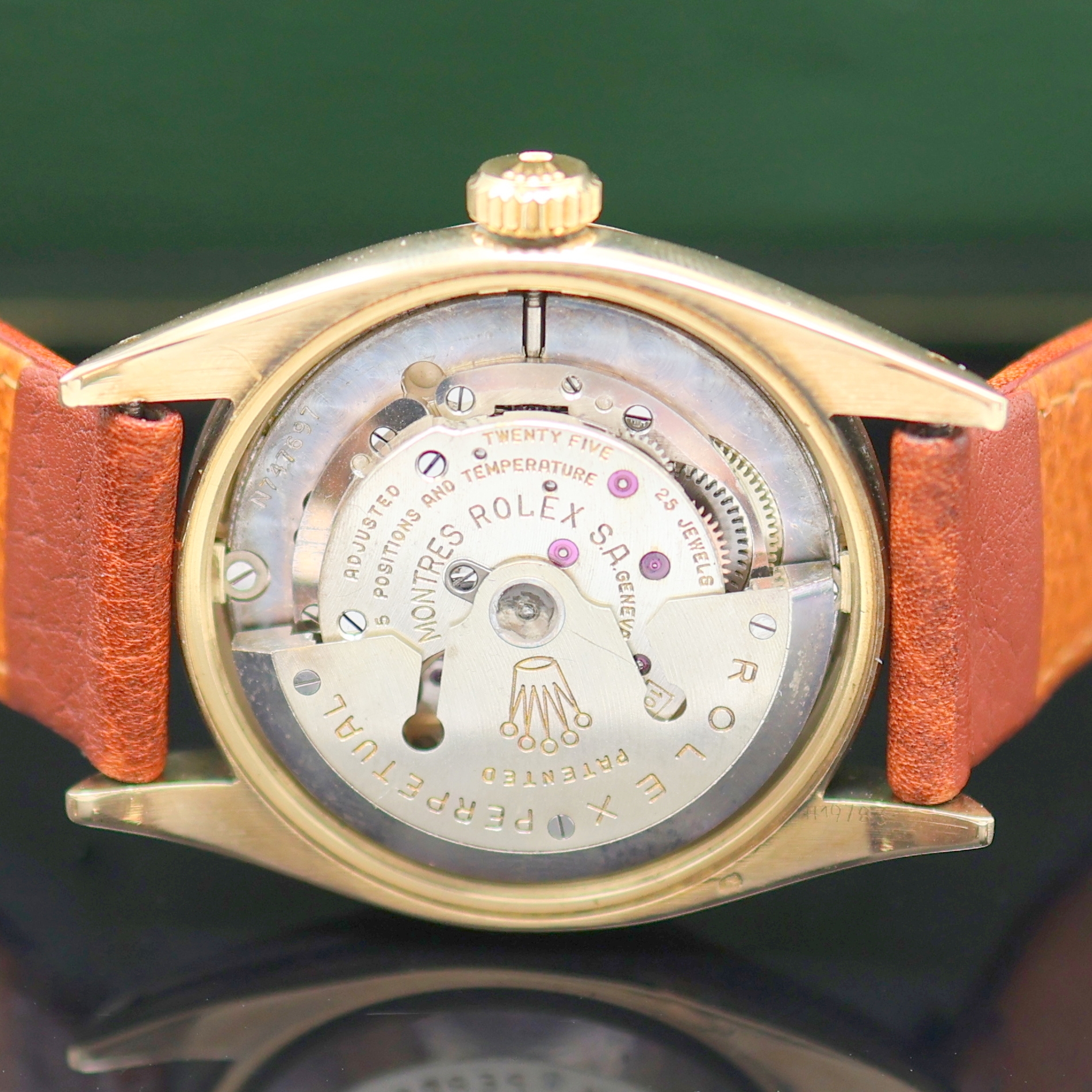 Detail e: ROLEX Oyster Perpetual Zephyr Armbandchronometer in GG 585/000 Referenz 6582, Schweiz um 1957, Automatik, 3-teil. Geh. inkl. Lederband m. orig. ...