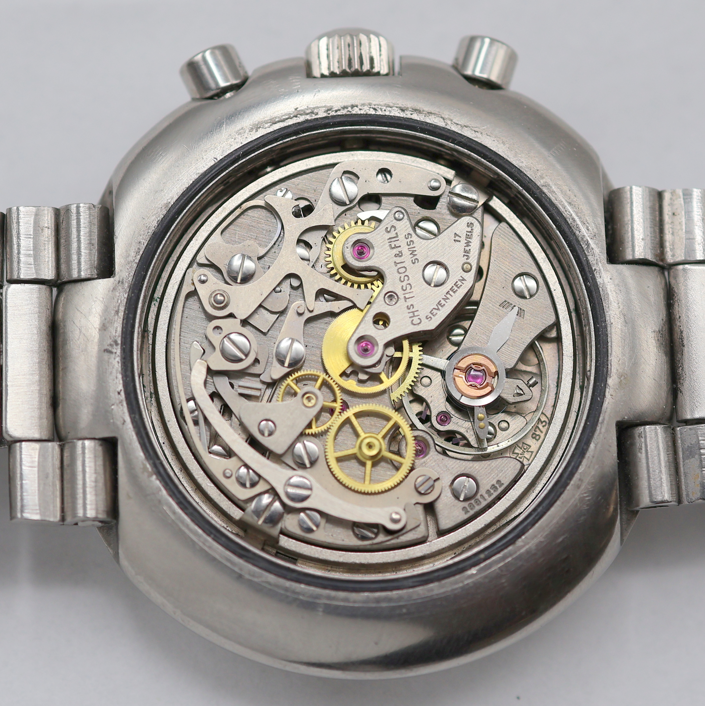 Detail e: TISSOT T12 Armbandchronograph in Edelstahl Referenz 40504, Schweiz um 1968, Handaufzug, 2-teil. Geh. inkl. original Gay Freres Band m. Faltschl., ...