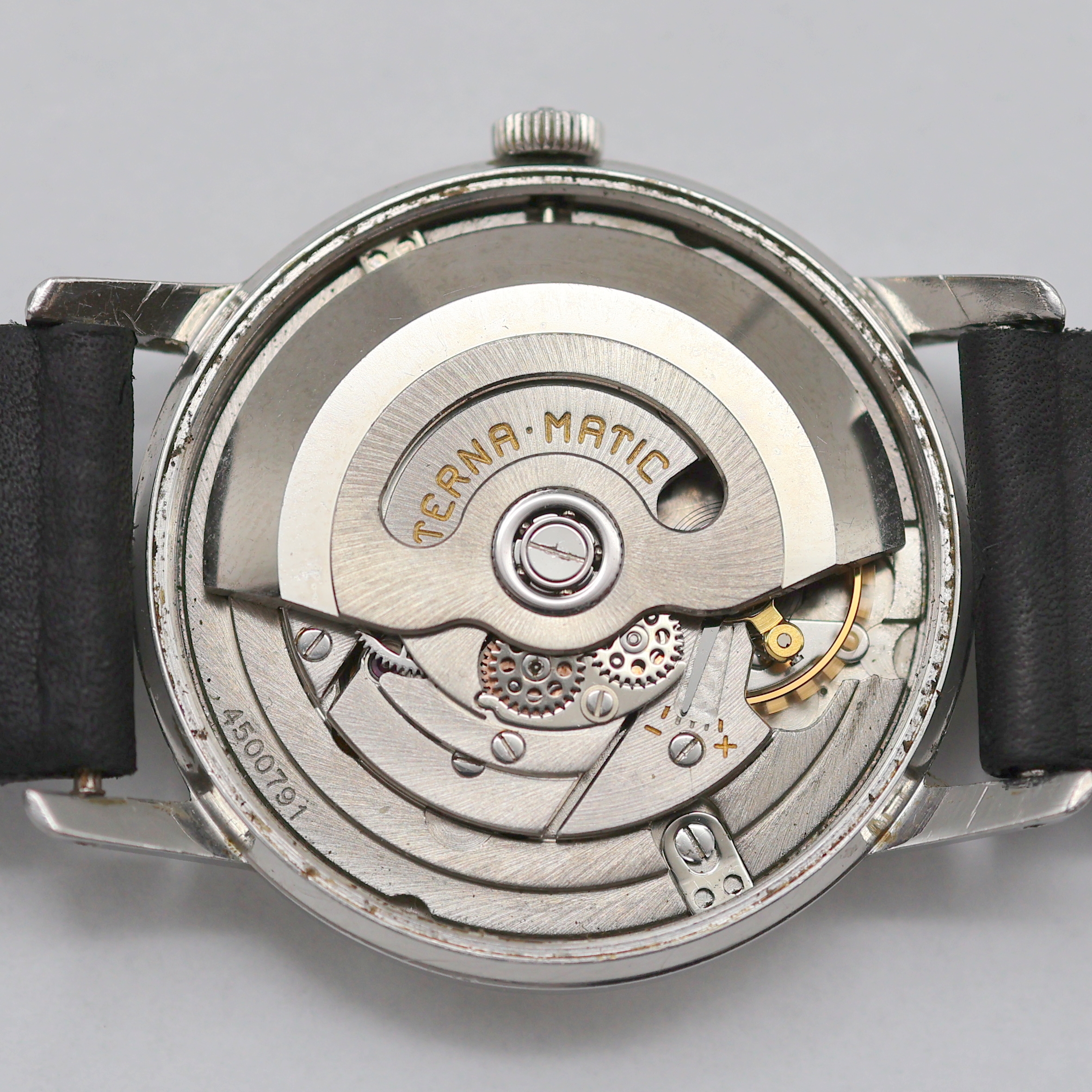 Detail e: ETERNA-MATIC Armbanduhr in Stahl, Schweiz 1960er Jahre, Automatik, Boden verschr., silb. Zifferbl. m. aufges. silb. Ind. fl./pat., silb. Zeiger, ...