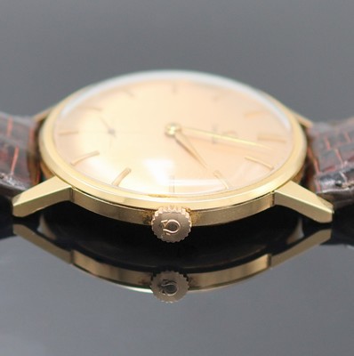 26988314b - OMEGA Armbanduhr in RG 750/000 Referenz 14715 61, Schweiz um 1963, Handaufzug, 3-teil. ...