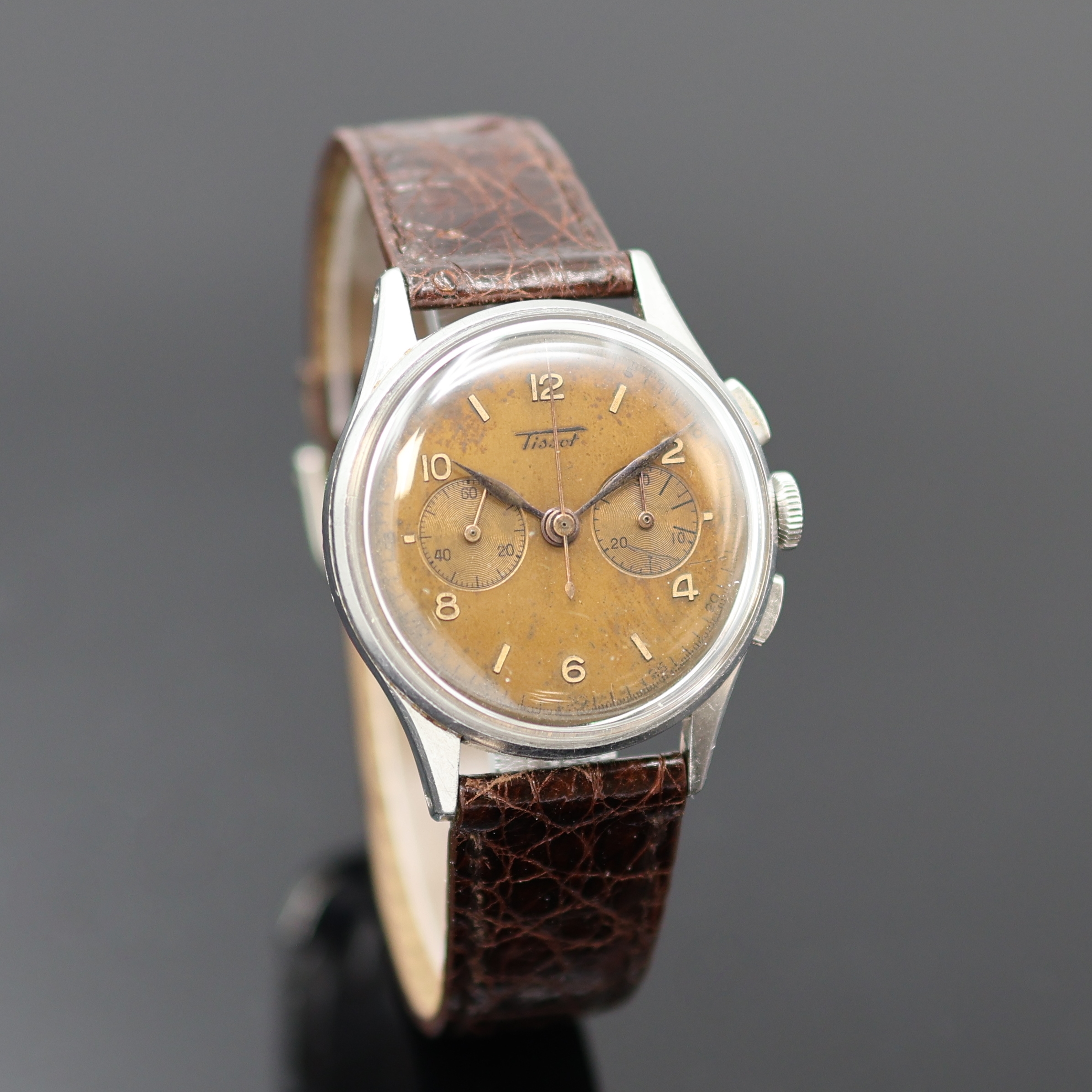 Detail b: TISSOT Armbandchronograph in Stahl Referenz 6212-5, Schweiz um 1945, Handaufzug, 3-tlg. Geh., Boden u. Glasrand aufgedr., rotgold. Zifferbl. stark ...