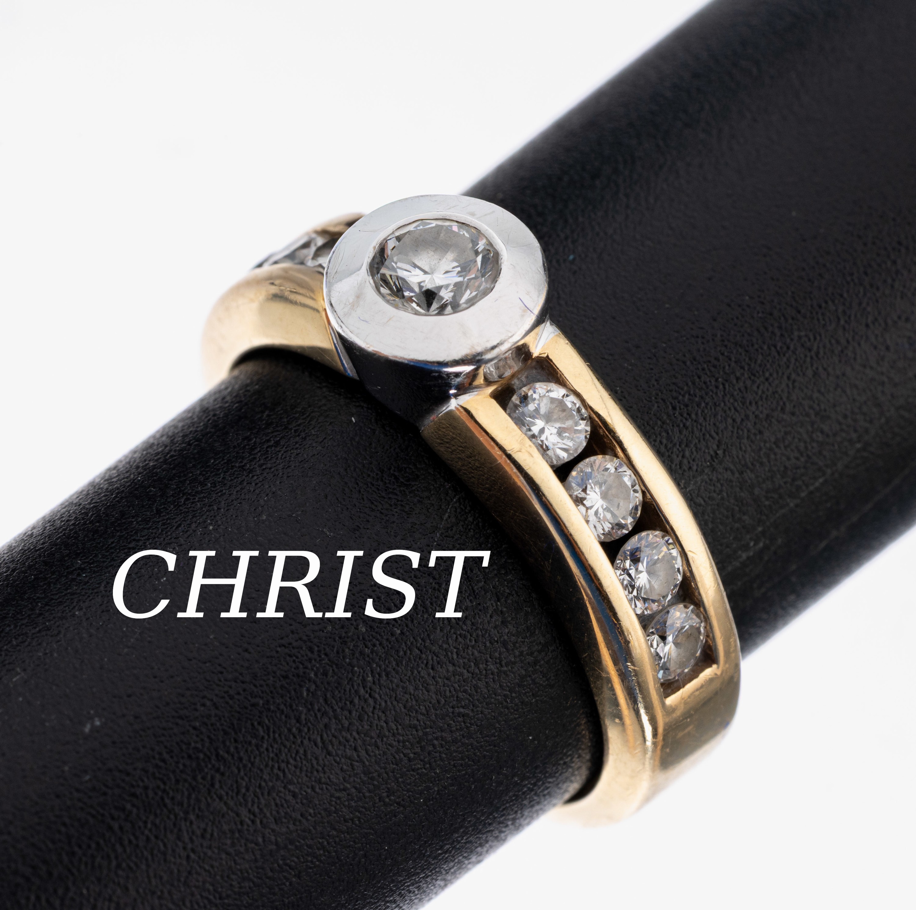 14 kt Gold CHRIST Brillant Ring, GG/WG 585/000, mittig in WG gefasster Brillant ca. 0.25 ct Weiß/si, seitl. flankiert von im Kanal gefassten 8 ...