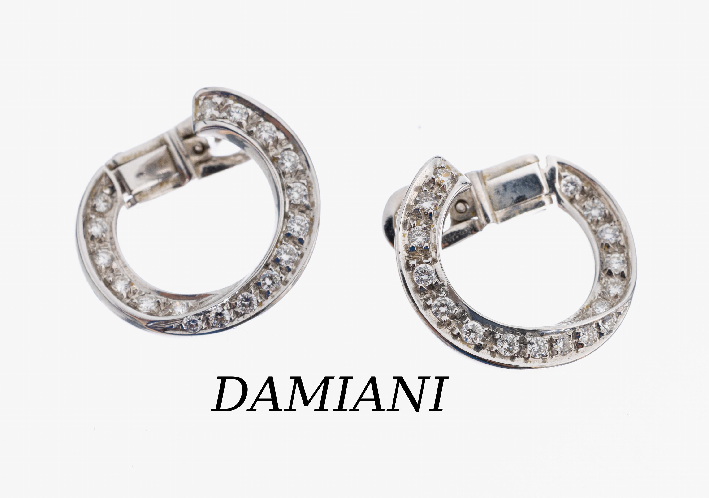 Paar 18 kt Gold DAMIANI Brillant Ohrstecker, WG 750/000, bes. mit 34 Brillanten zus. ca.0.34 ct Weiß/si, ca. 4.7 g