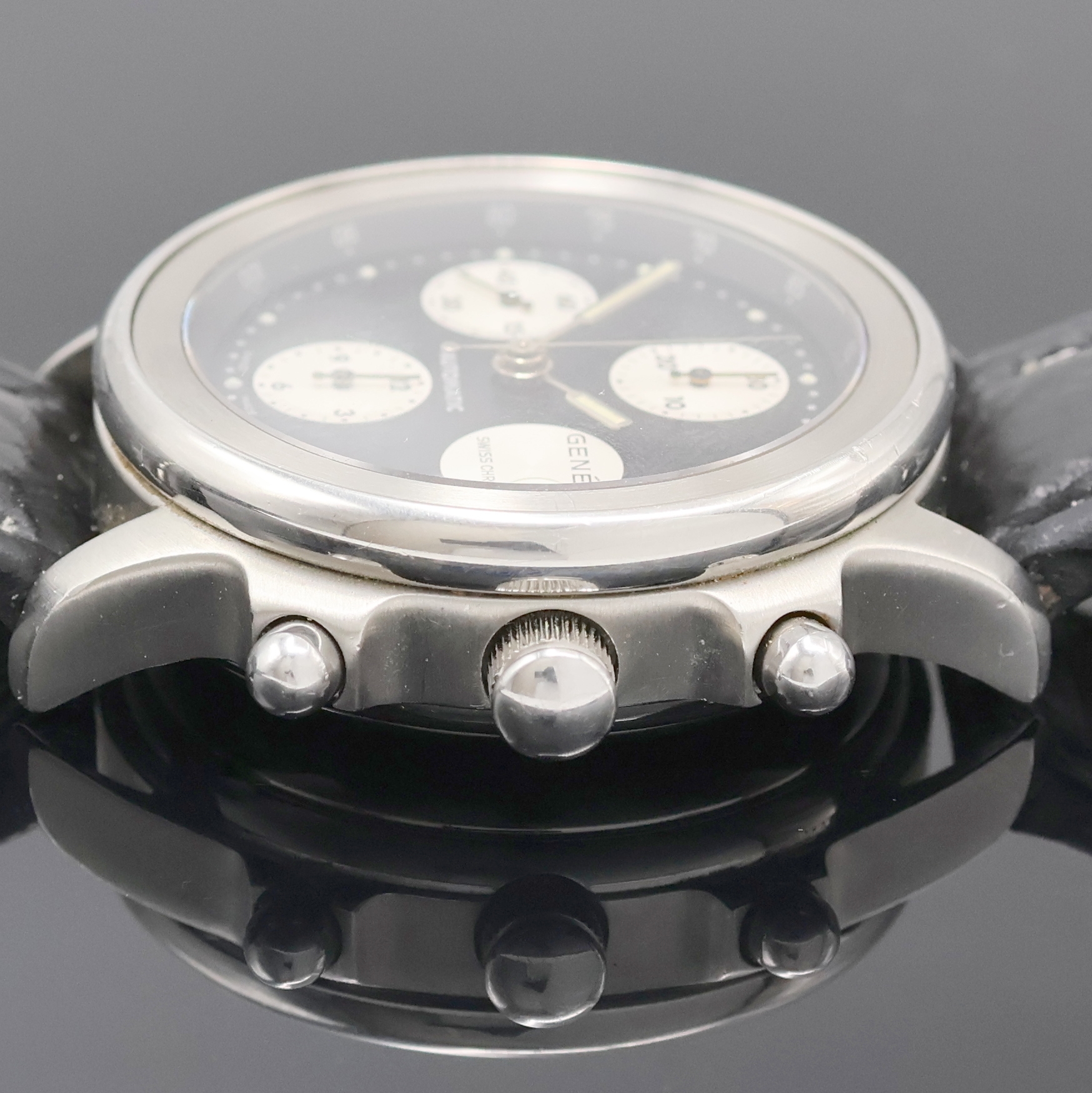 Detail b: GENÉE Armbandchronograph in Stahl, Automatik, Schweiz um 1990, Boden verschr., schwarzes Zifferbl. m. silb. Hilfsblättern, Anz. v. Std., Min., kl. ...