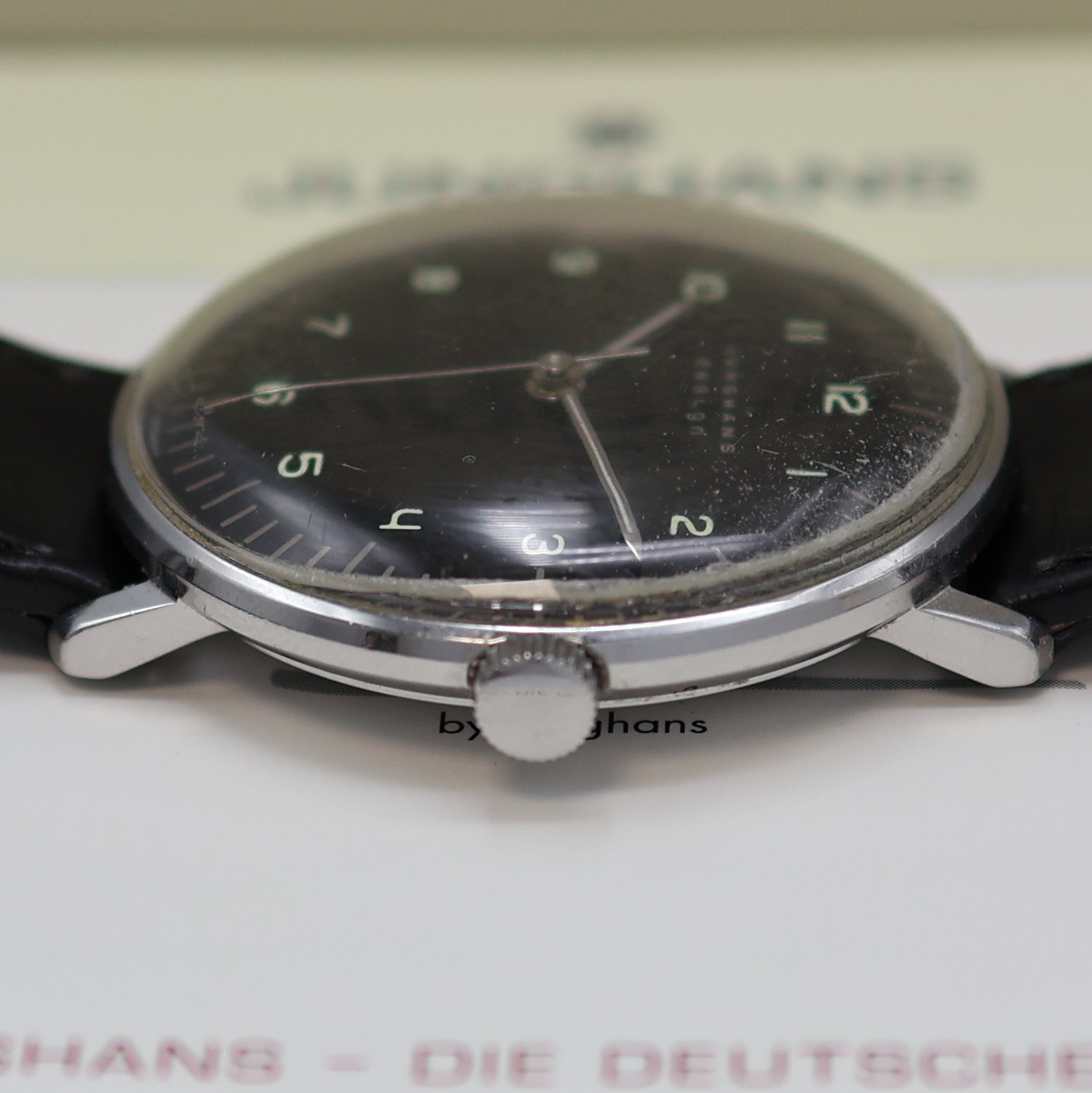Detail c: JUNGHANS Armbanduhr Max Bill Referenz 27.3702, Deutschland um 2005, Handaufzug, Edelstahlgeh., Boden verschr., schwarzes Zifferbl. m. Leuchtzahlen, ...