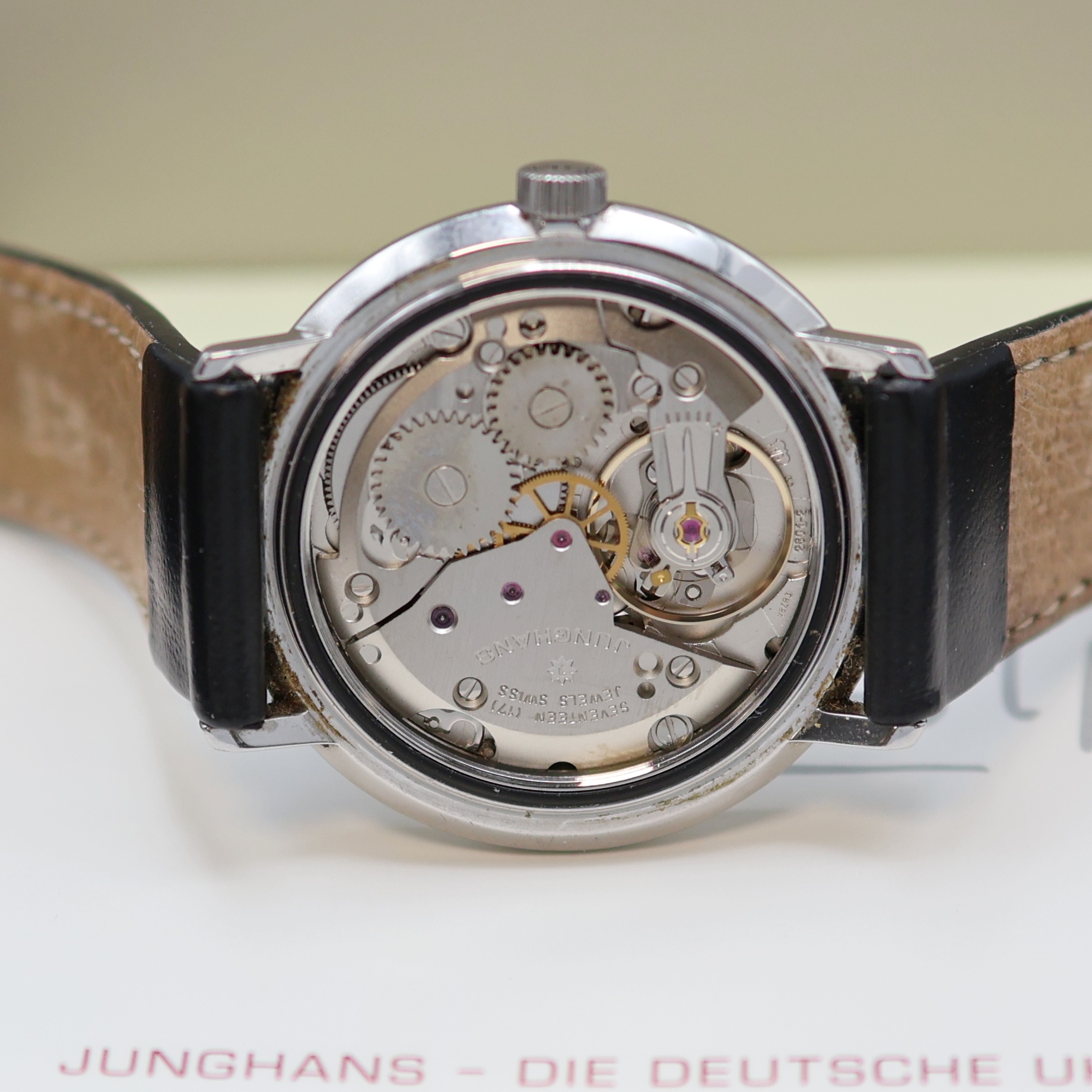 Detail e: JUNGHANS Armbanduhr Max Bill Referenz 27.3702, Deutschland um 2005, Handaufzug, Edelstahlgeh., Boden verschr., schwarzes Zifferbl. m. Leuchtzahlen, ...