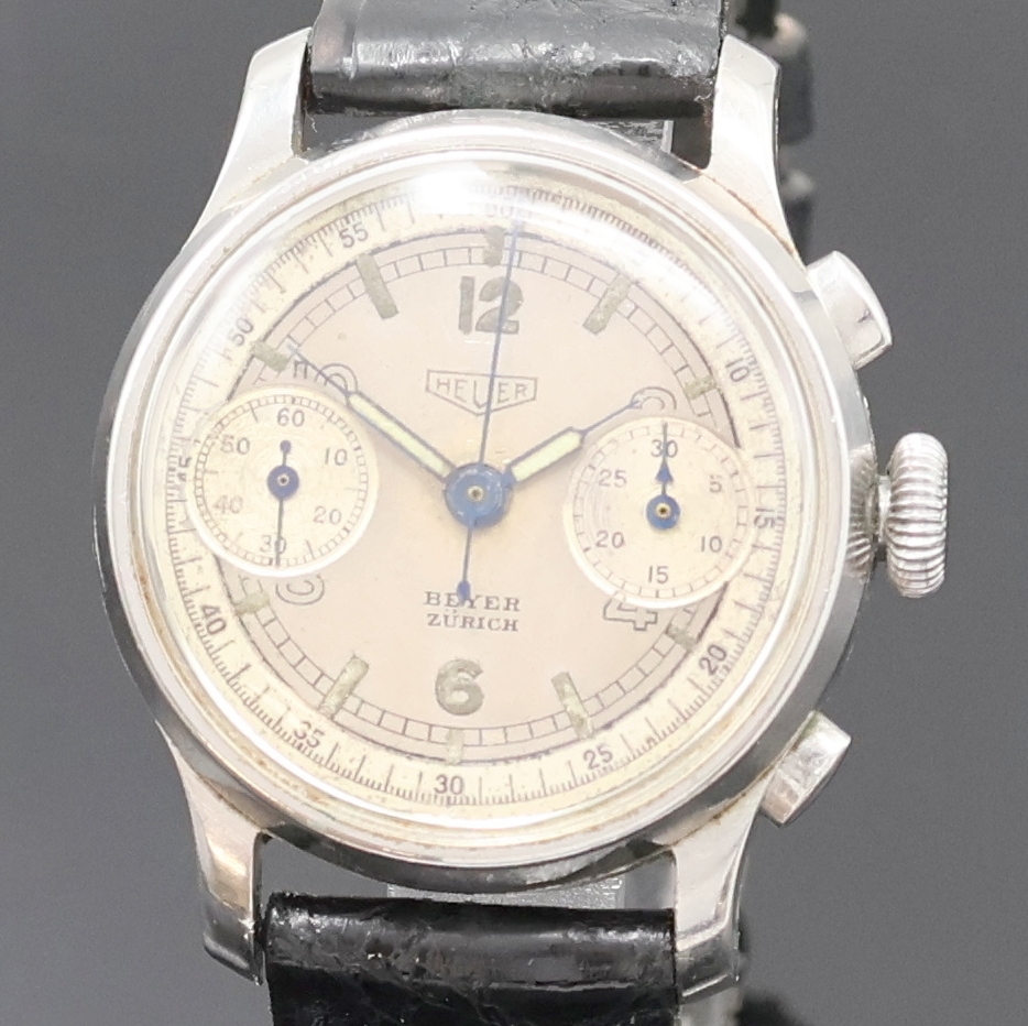 Detail a: HEUER / BEYER ZÜRICH Schaltradchronograph in Stahl, Schweiz um 1940, Handaufzug, 3-teil. Geh., Boden und Glasrand aufgedr., orig. Krone und ...