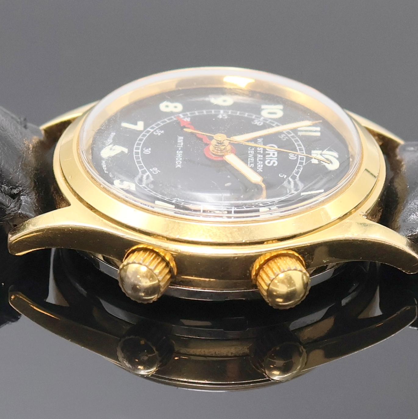 Detail c: ORIS Armbandwecker Modell Wrist Alarm Referenz 420-7387, Schweiz um 1988, Handaufzug, verg. Metallgeh., Edelst.-Boden verschr., schwarzes ...
