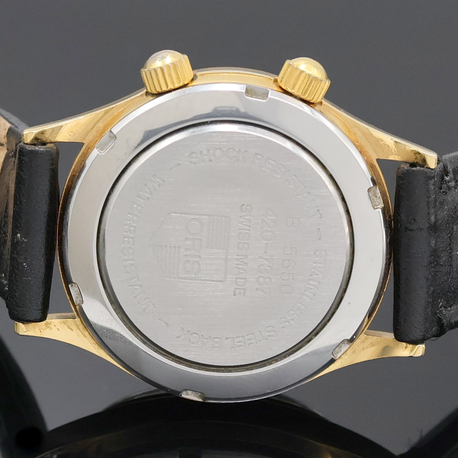 Detail d: ORIS Armbandwecker Modell Wrist Alarm Referenz 420-7387, Schweiz um 1988, Handaufzug, verg. Metallgeh., Edelst.-Boden verschr., schwarzes ...