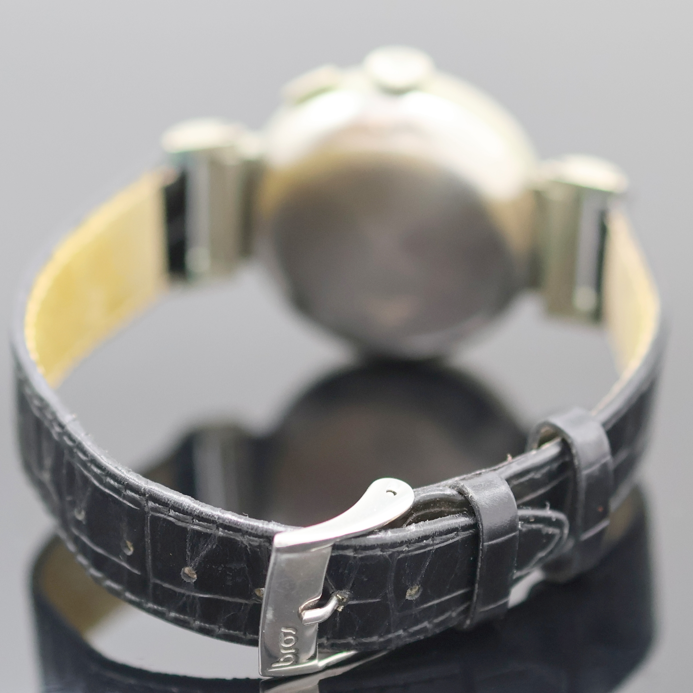 Detail b: PIERCE seltener Eindrücker- Schaltradchronograph, Schweiz 1930er Jahre, vern. Geh., Glasrand und Edelstahlboden aufgedr., bewegl. Bandanst., silb. ...