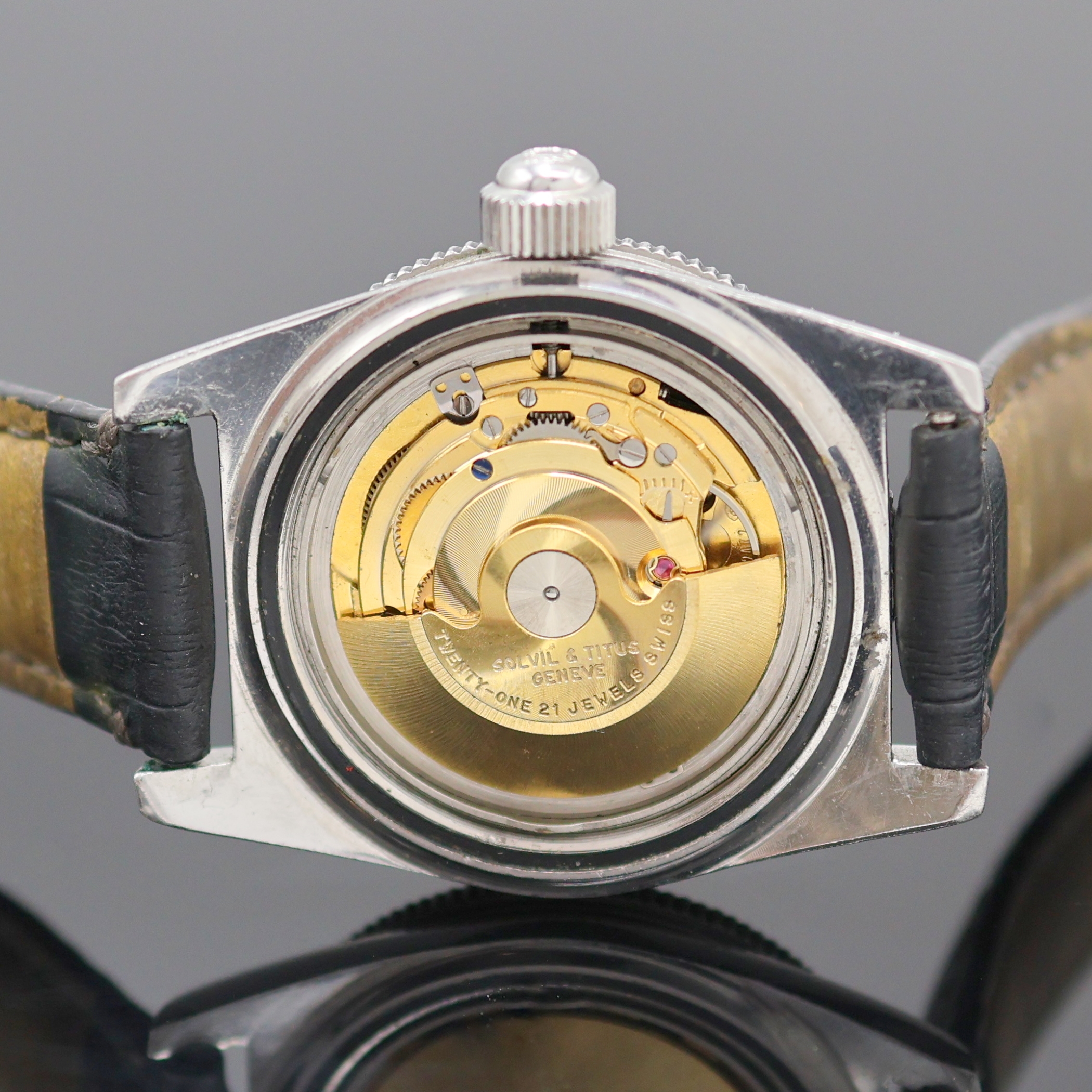 Detail e: TITUS Calypsomatic seltene Herrenarmbanduhr Referenz 7840, Automatik, Schweiz 1960er Jahre, Edelstahlgeh., Boden verschr., Bakelit-Lünette m. 60er ...