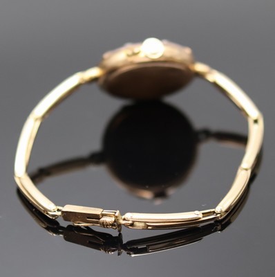 26991265b - Frühe Damenarmbanduhr in RG 585/000 mit Diamanten und Rubinen, Schweiz um 1910, ...