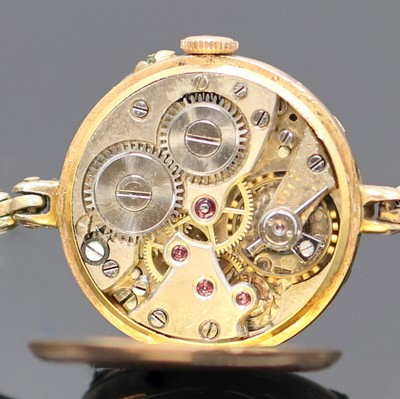 26991265f - Frühe Damenarmbanduhr in RG 585/000 mit Diamanten und Rubinen, Schweiz um 1910, ...