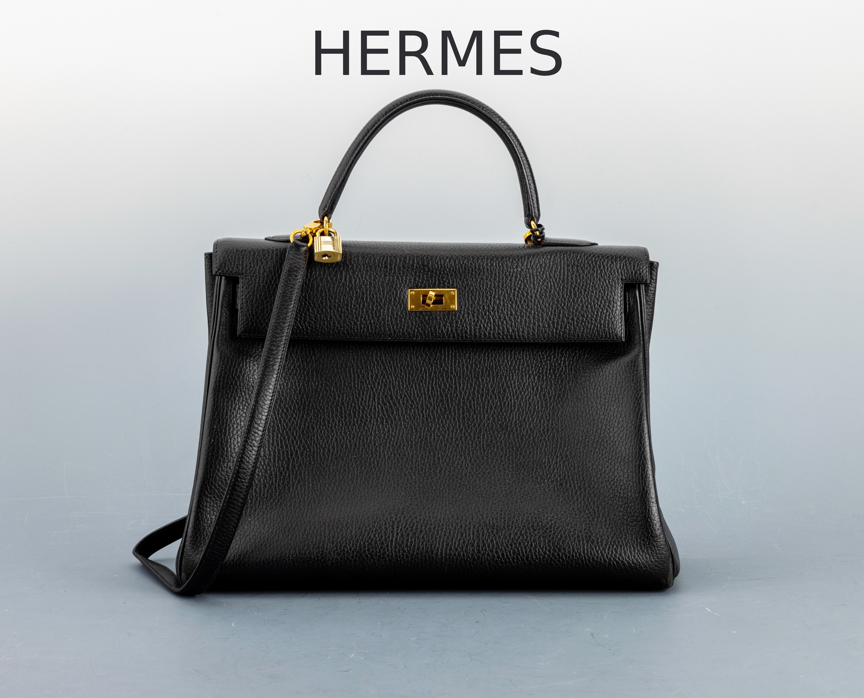 Image 26991500 - HERMES Kelly Bag, 1983, schwarzes Togo Leder, orig. Clochette und Schloss, Trageriemen, ...