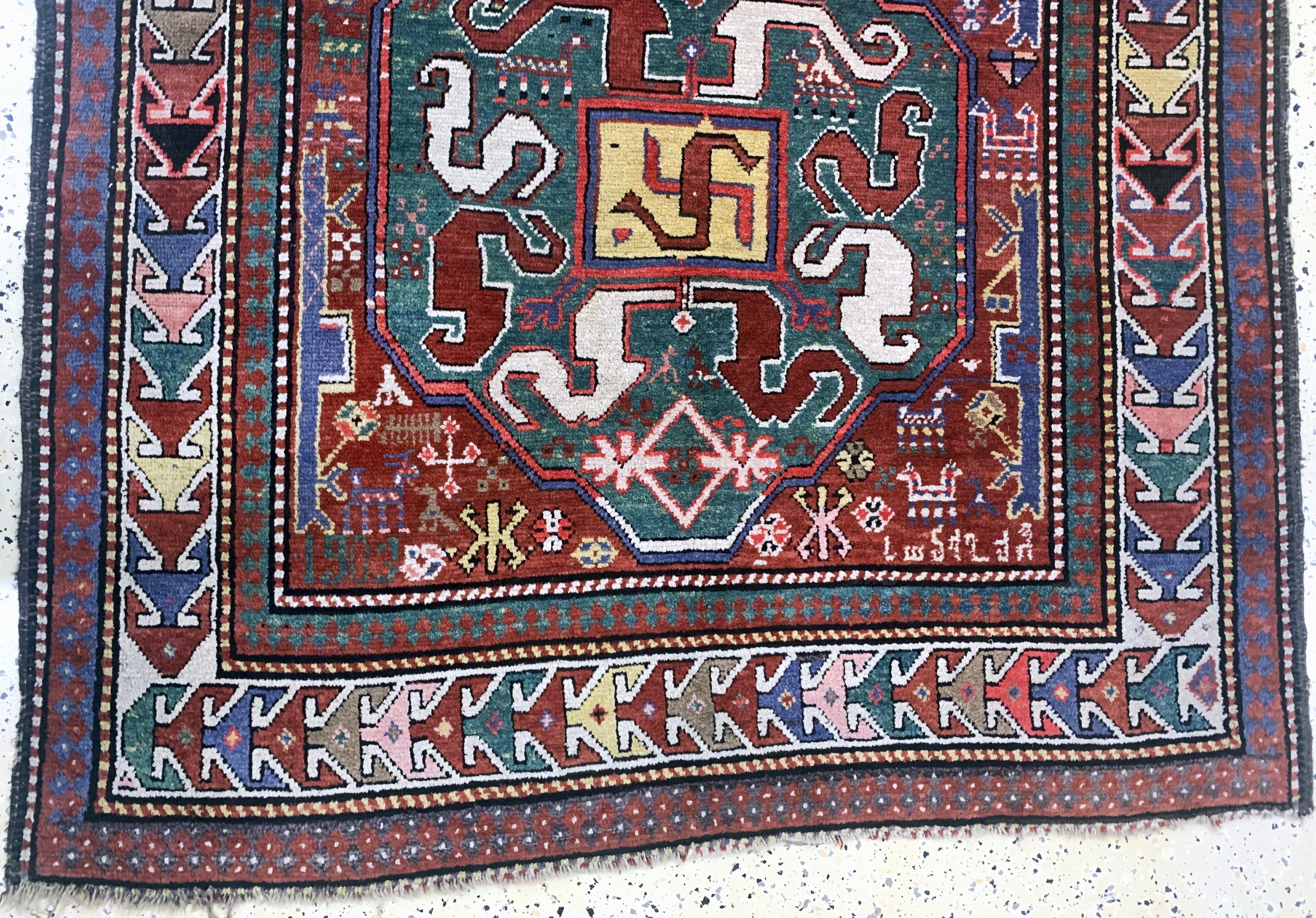 Detail c: "Wolkenband-Kazak"antik, Kaukasus, datiert 1903 , Wolle auf Wolle, ca. 245 x 137 cm, EHZ: 2-3