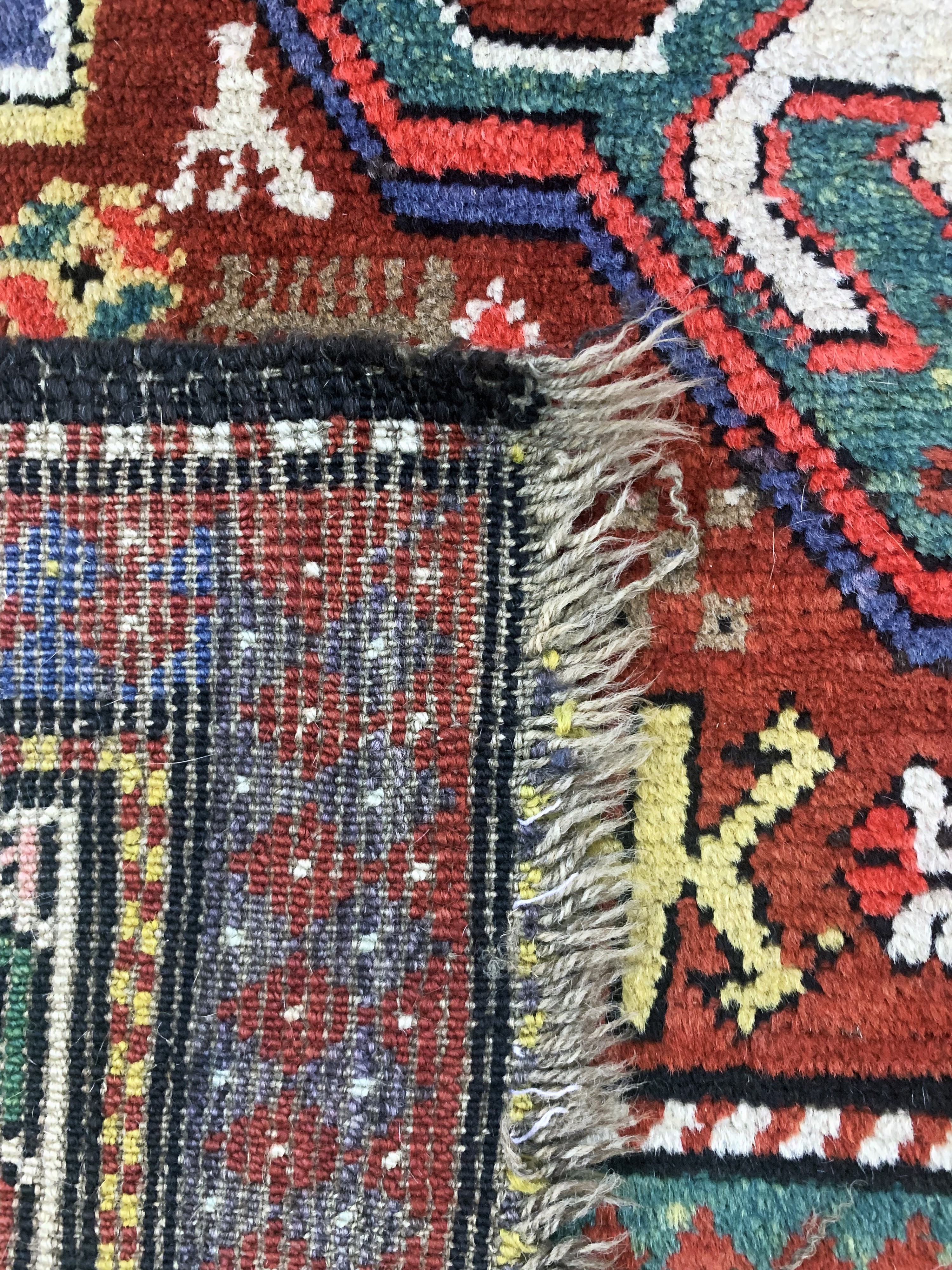 Detail g: "Wolkenband-Kazak"antik, Kaukasus, datiert 1903 , Wolle auf Wolle, ca. 245 x 137 cm, EHZ: 2-3